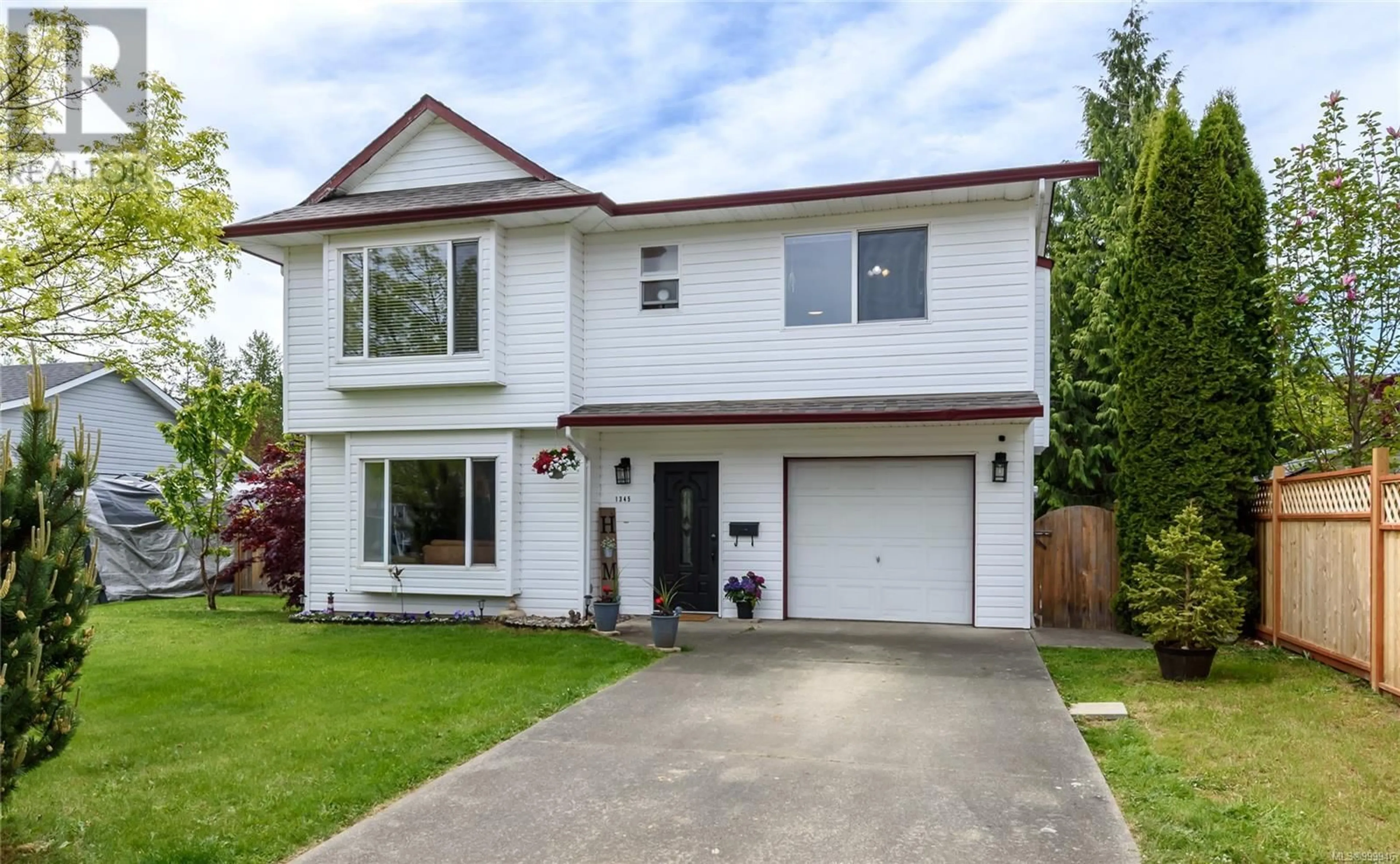 Home with vinyl exterior material, street for 1345 LARSEN ROAD, Courtenay British Columbia V9N8Y9