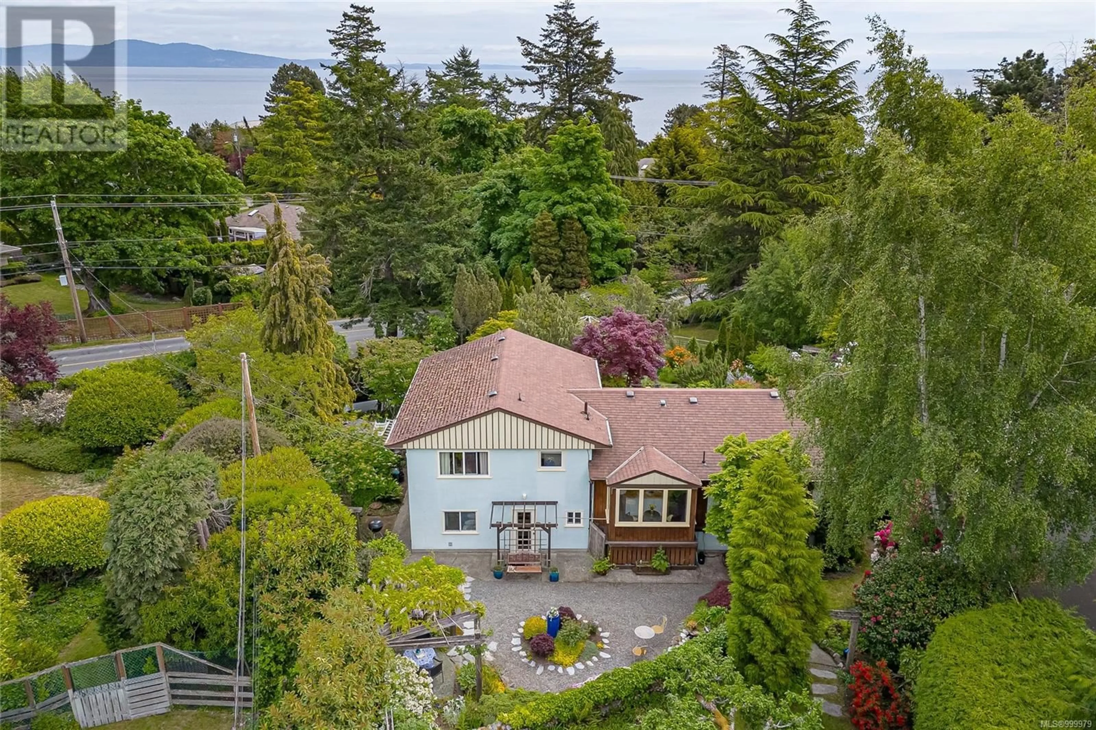 A pic from outside/outdoor area/front of a property/back of a property/a pic from drone, water/lake/river/ocean view for 2195 FERNDALE ROAD, Saanich British Columbia V8N2Z2