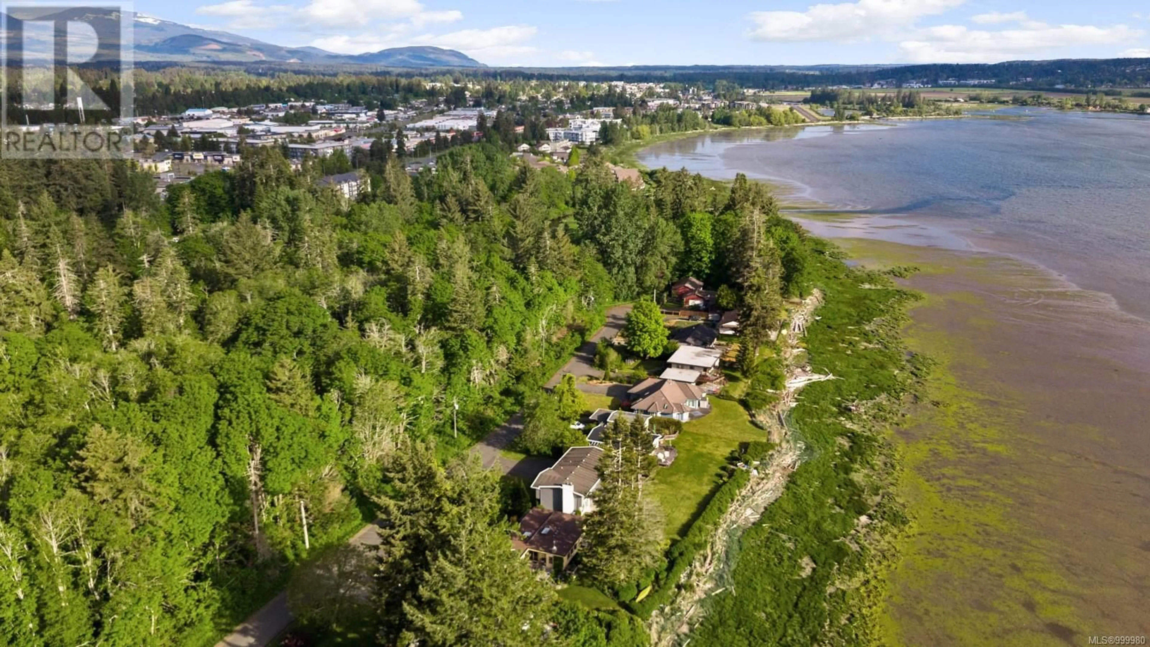 A pic from outside/outdoor area/front of a property/back of a property/a pic from drone, water/lake/river/ocean view for 3440 SANDPIPER DRIVE, Courtenay British Columbia V9N9T9