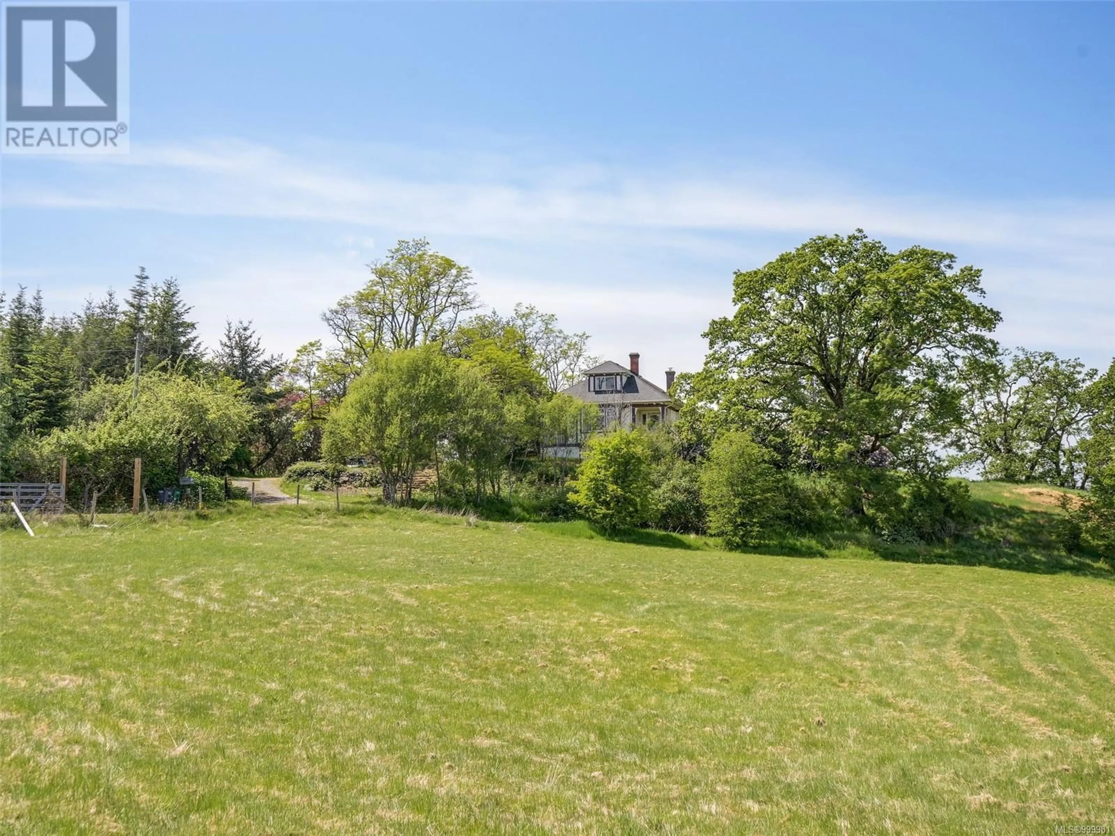 A pic from outside/outdoor area/front of a property/back of a property/a pic from drone, forest/trees view for 4512 WILKINSON ROAD, Saanich British Columbia V8Z5B7
