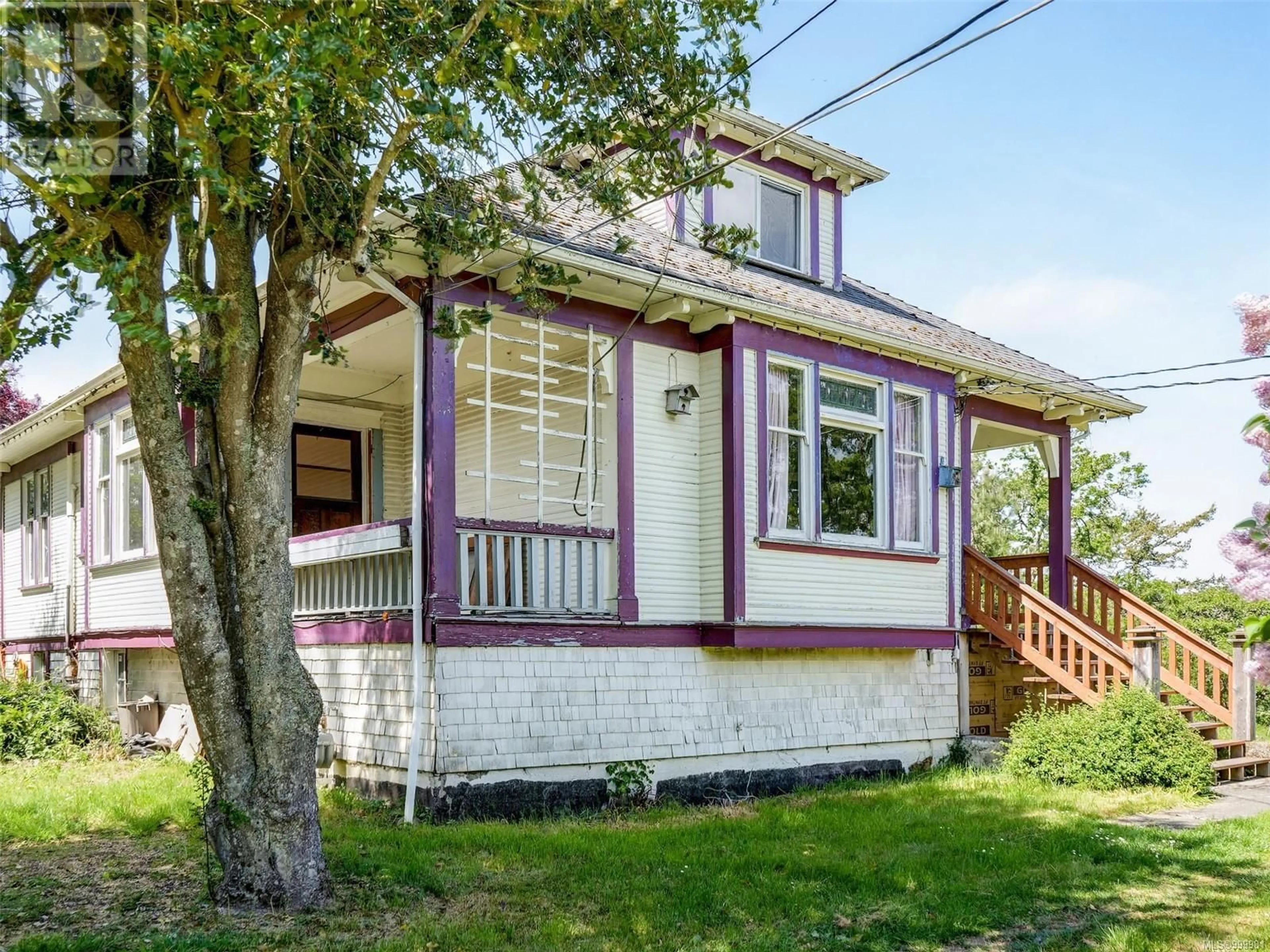 Home with vinyl exterior material, street for 4512 WILKINSON ROAD, Saanich British Columbia V8Z5B7