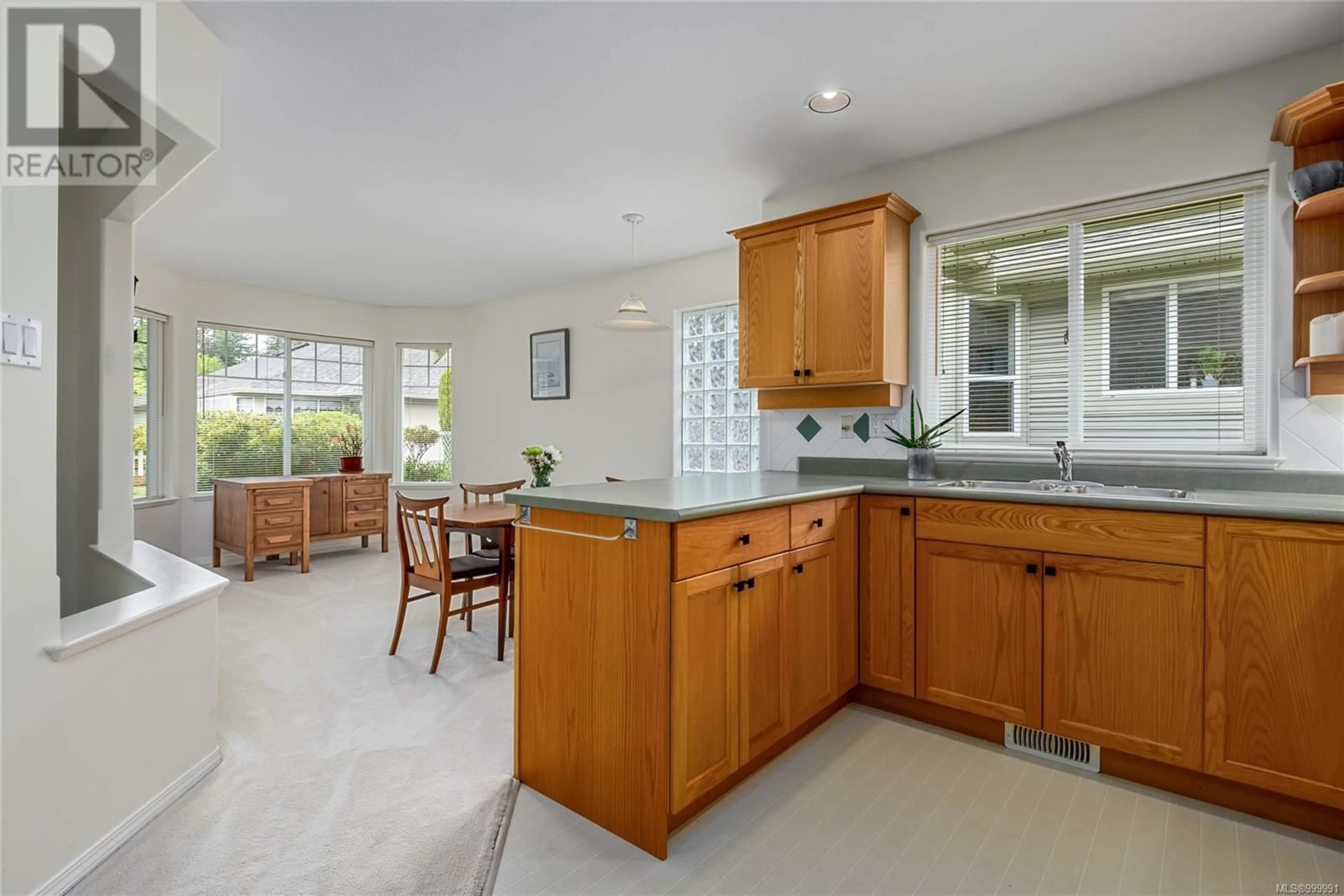 Open concept kitchen, ceramic/tile floor for 8 - 1600 BALMORAL AVENUE, Comox British Columbia V9M2N2