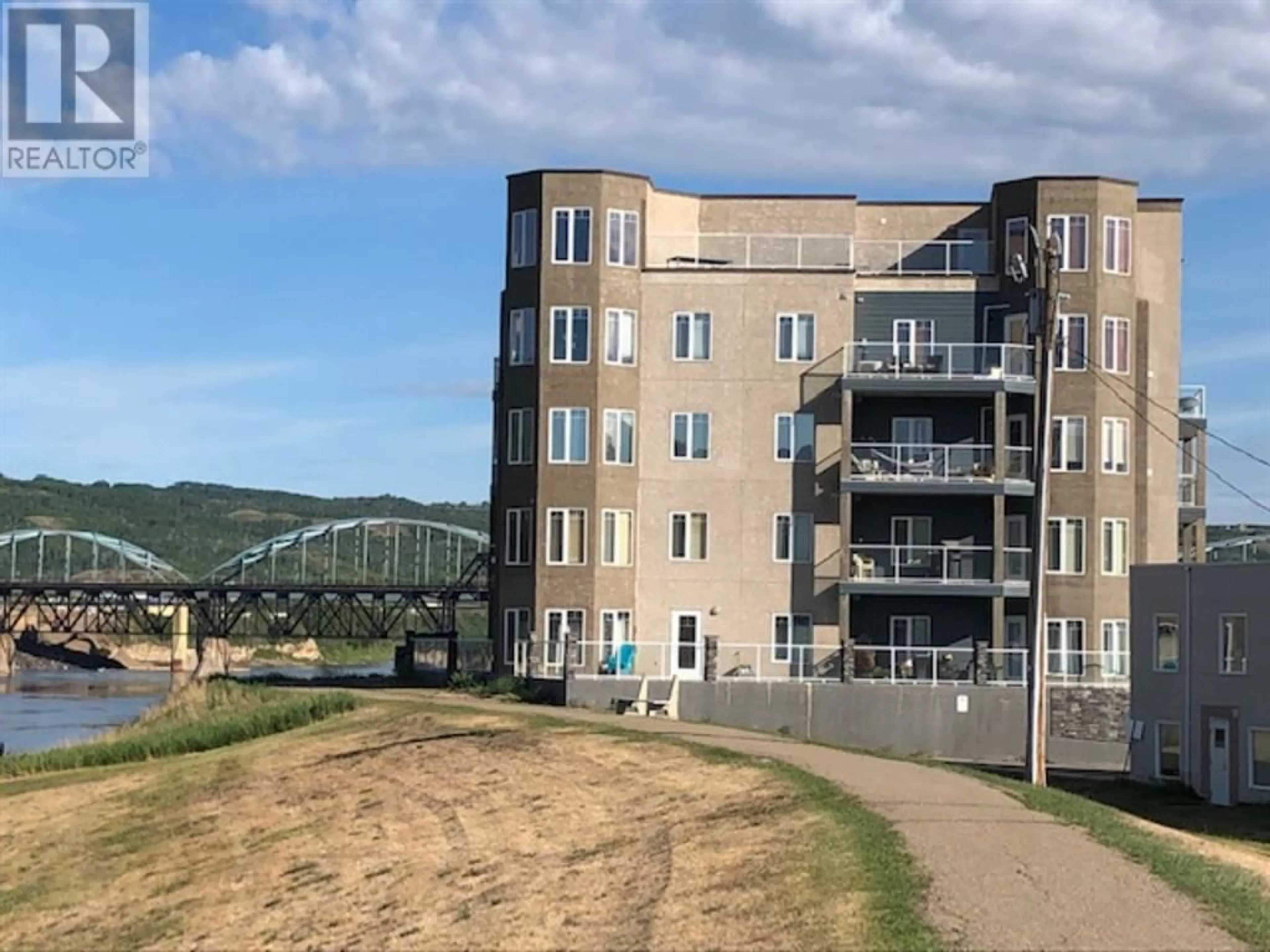 A pic from exterior of the house or condo for #201 9810 94 Street, Peace River Alberta T8S0A1