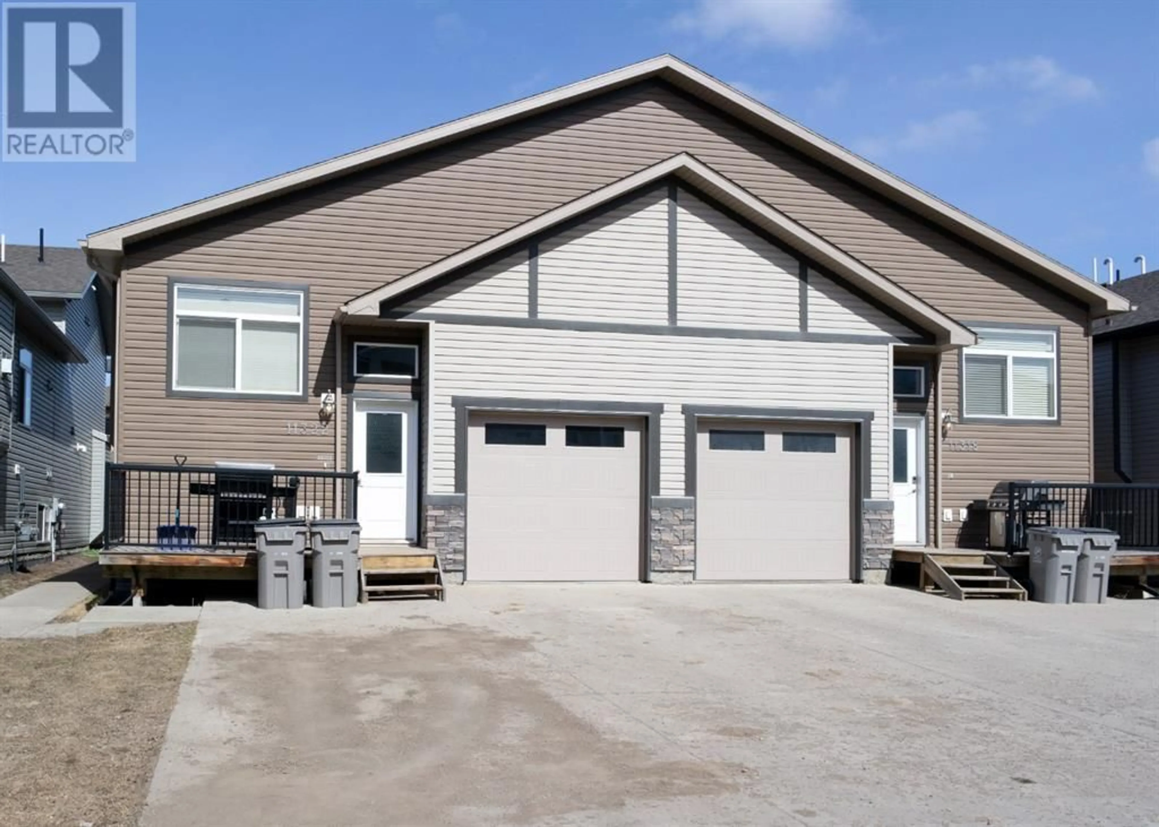 Frontside or backside of a home for 11322 105 Avenue, Grande Prairie Alberta T8V3Z3