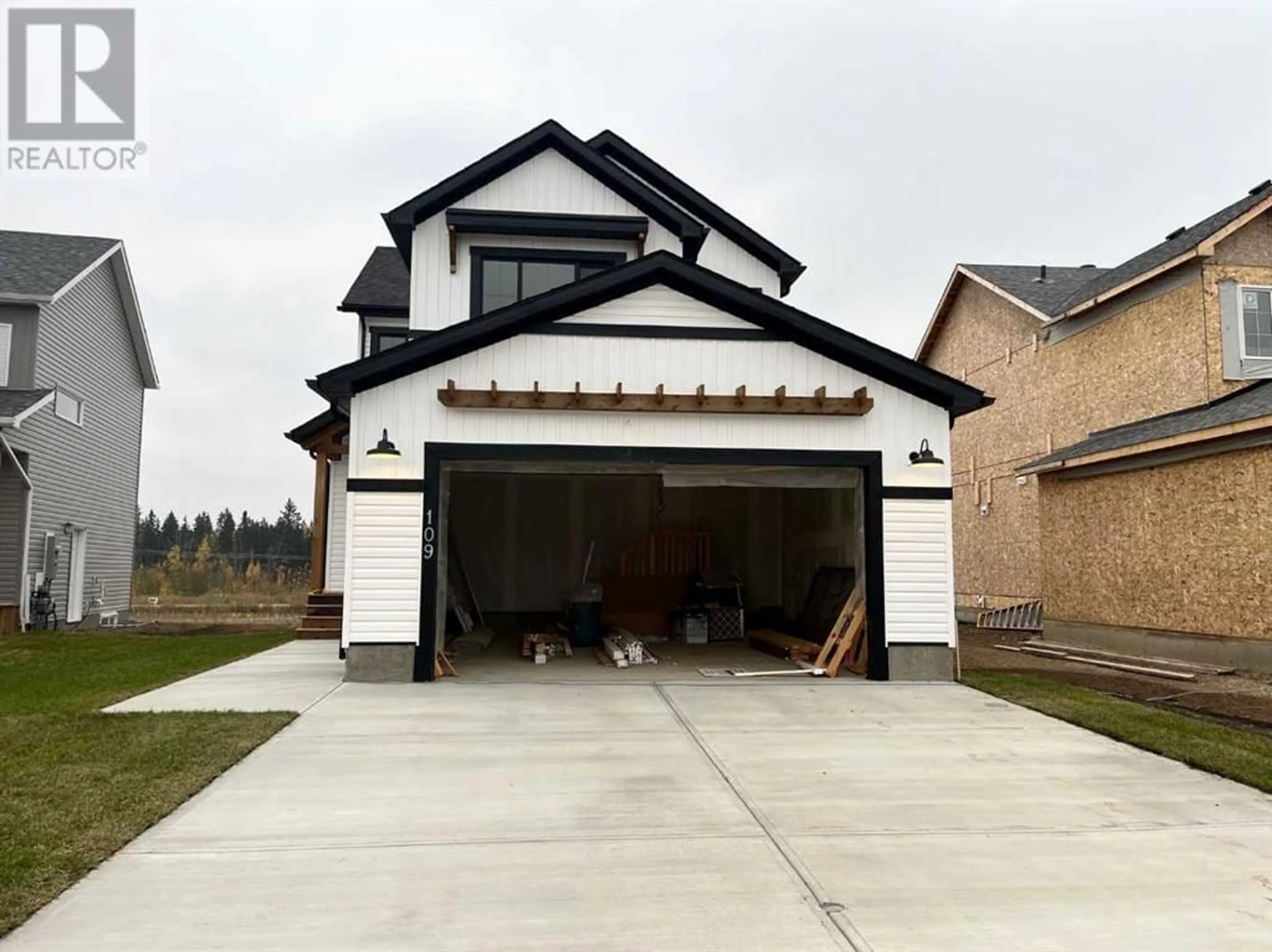 Frontside or backside of a home for 109 Hodgins Avenue, Fort McMurray Alberta T9H0H4