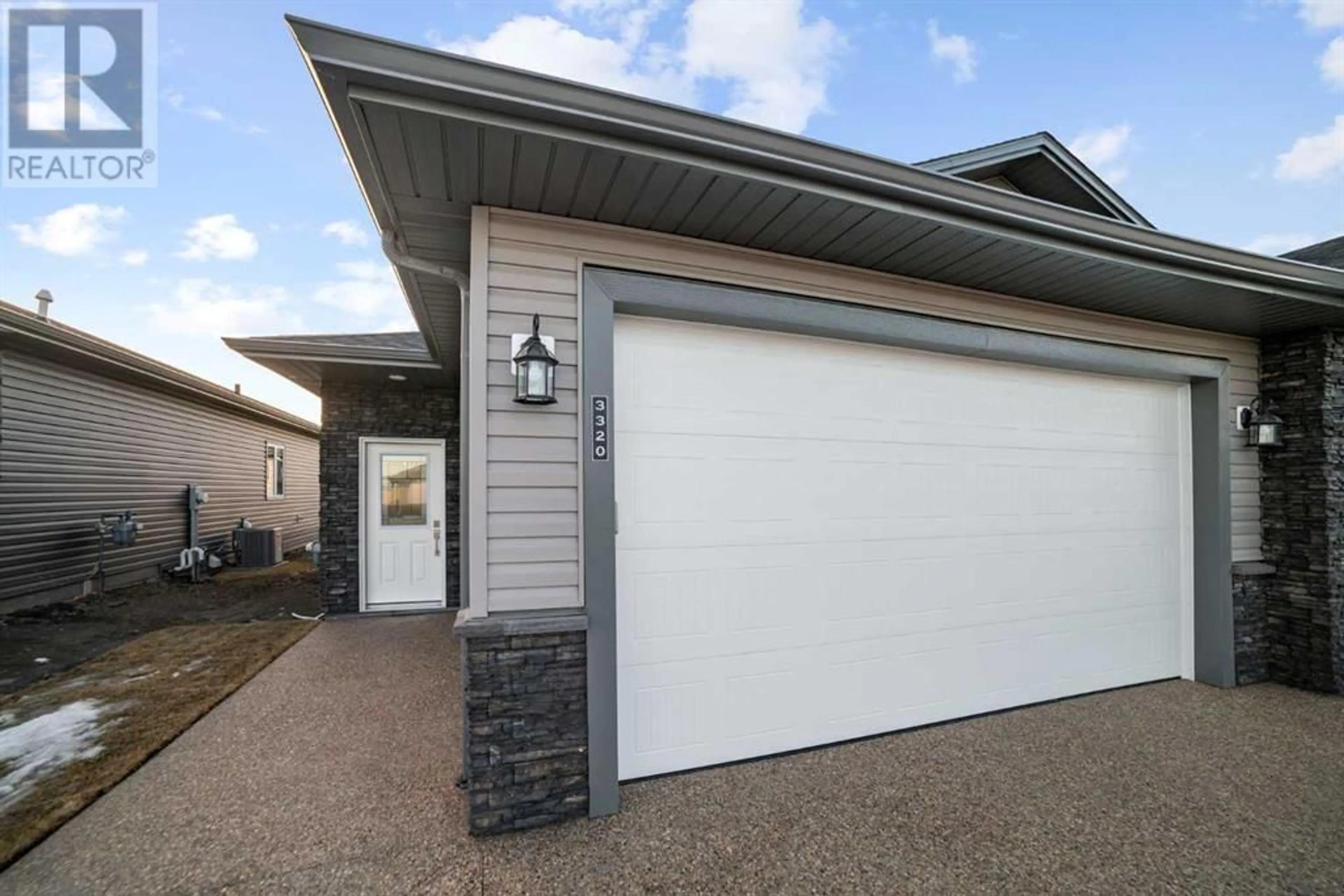 Home with vinyl exterior material for 3320 50A StreetClose, Camrose Alberta T4V5K9