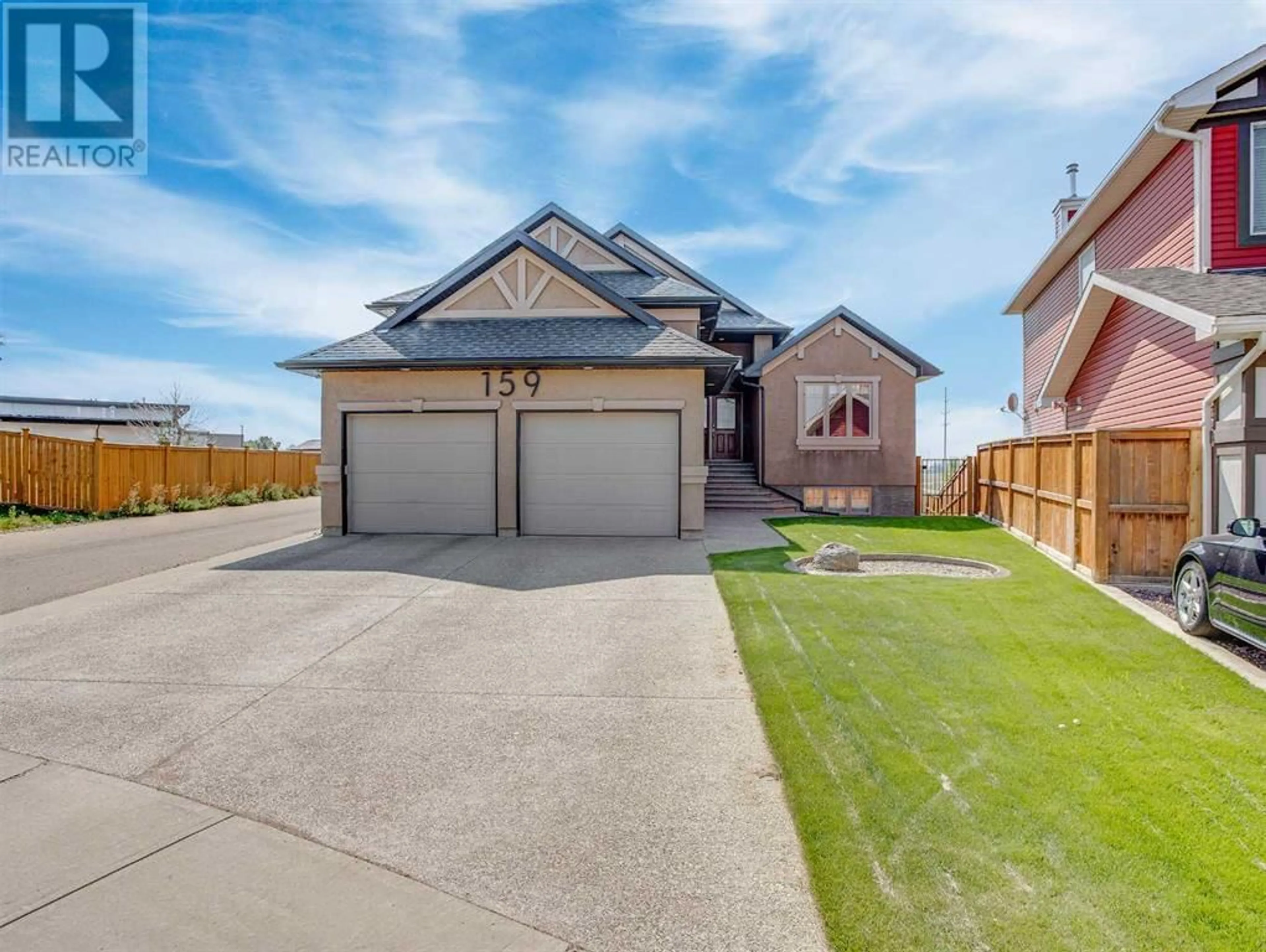 Frontside or backside of a home for 159 Jessie Robinson Close N, Lethbridge Alberta T1H6Y5