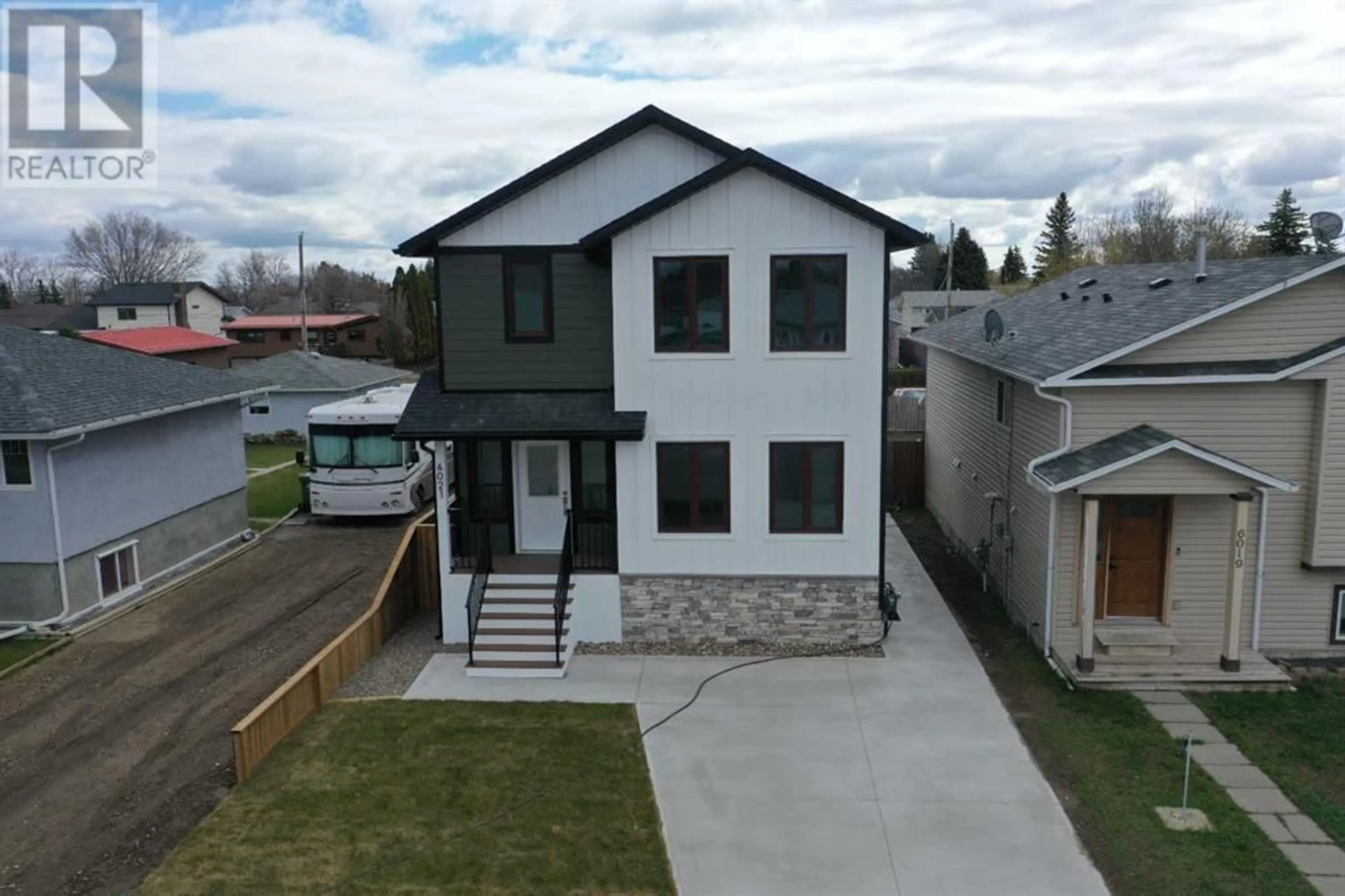 Frontside or backside of a home for 6021 52 Street, Taber Alberta T1G1J8