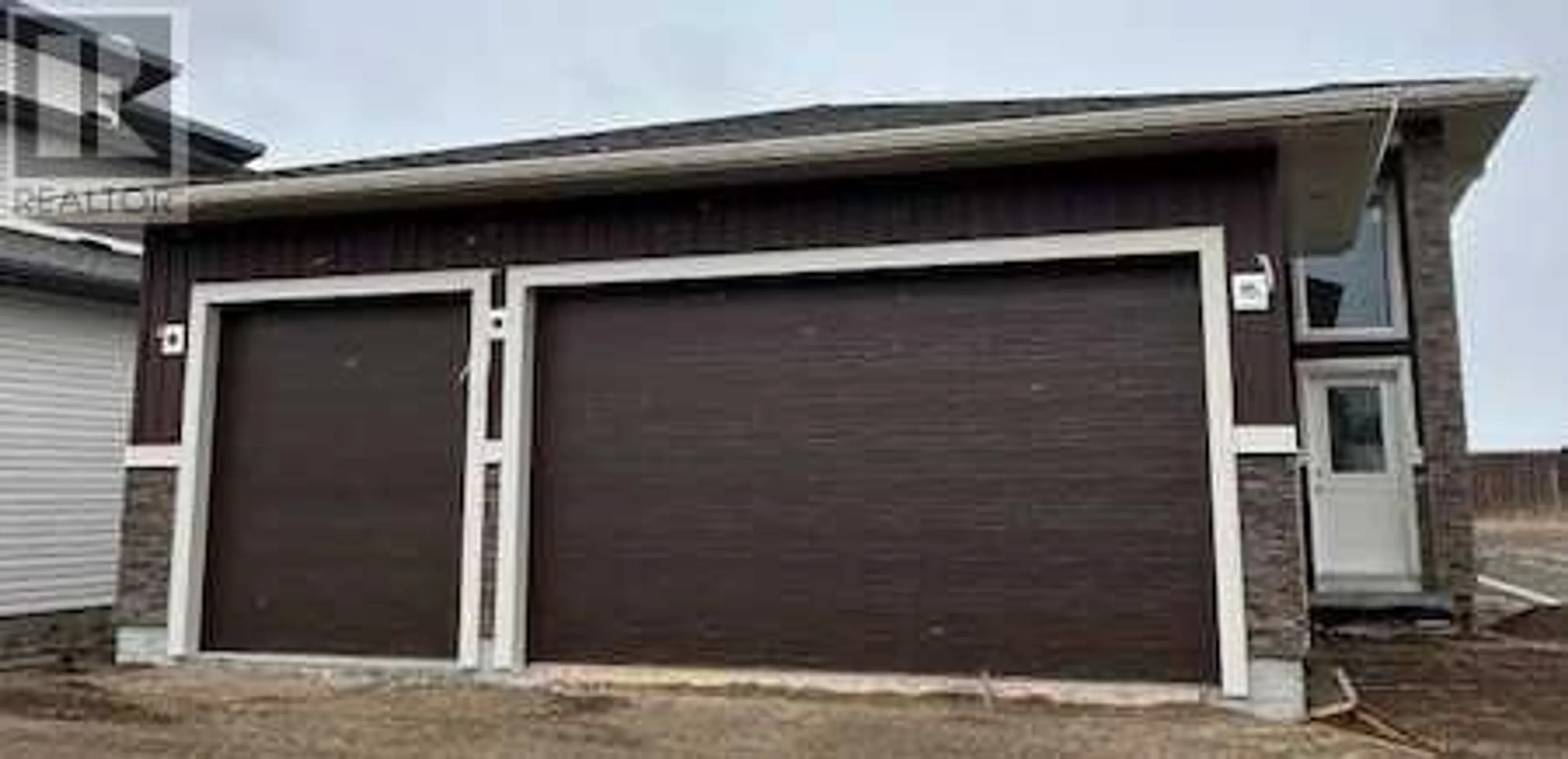 Frontside or backside of a home for 11322 107 Avenue, Grande Prairie Alberta T8V1L1