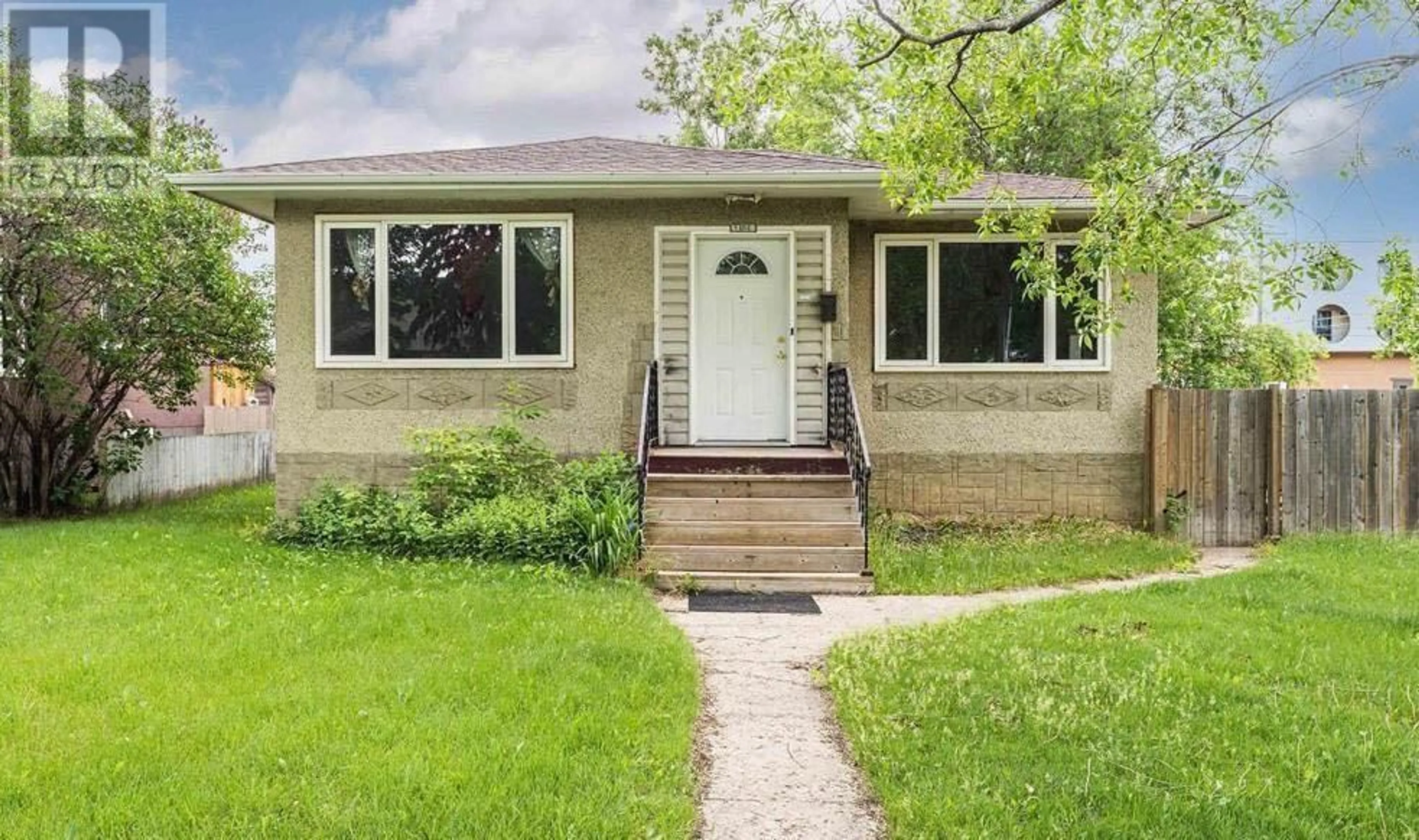 Frontside or backside of a home for 12105 79 Street, Edmonton Alberta T5B2L6