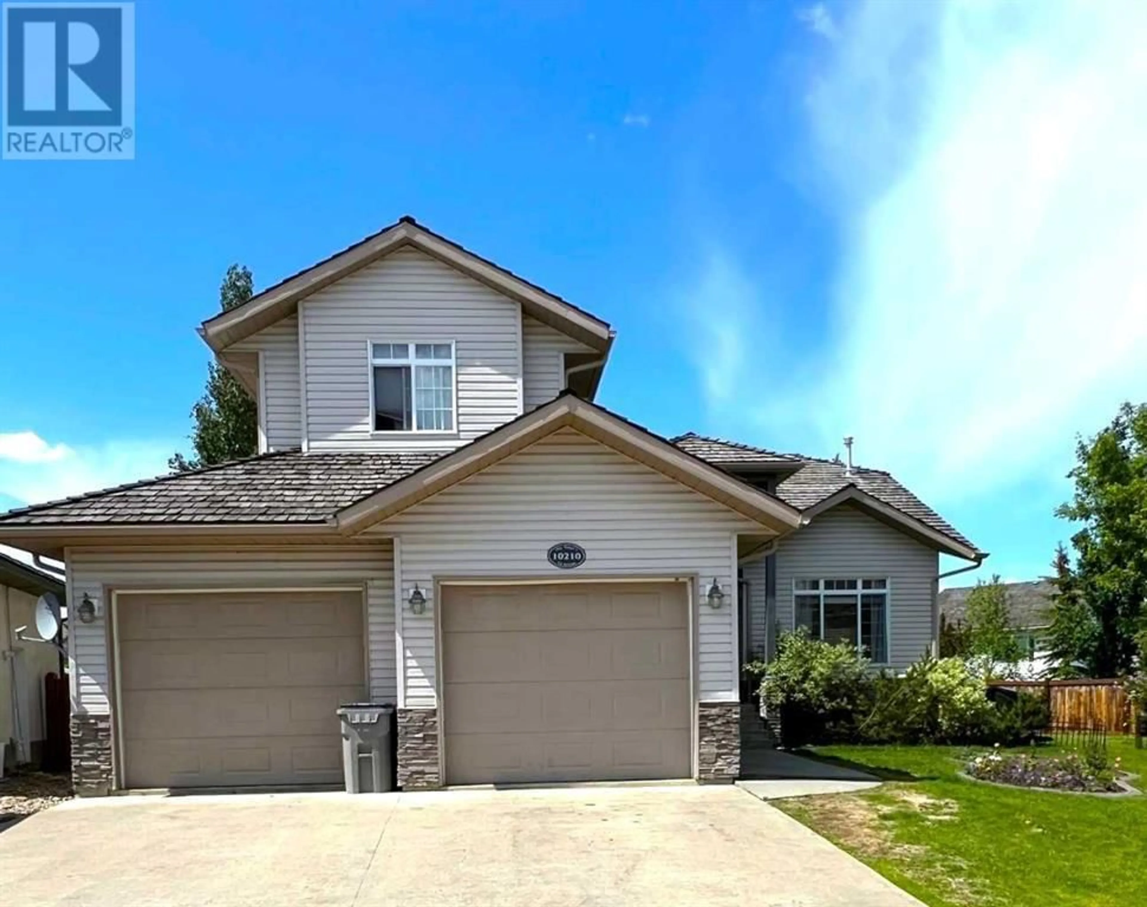 Frontside or backside of a home for 10210 72 Avenue, Grande Prairie Alberta T8V2W5