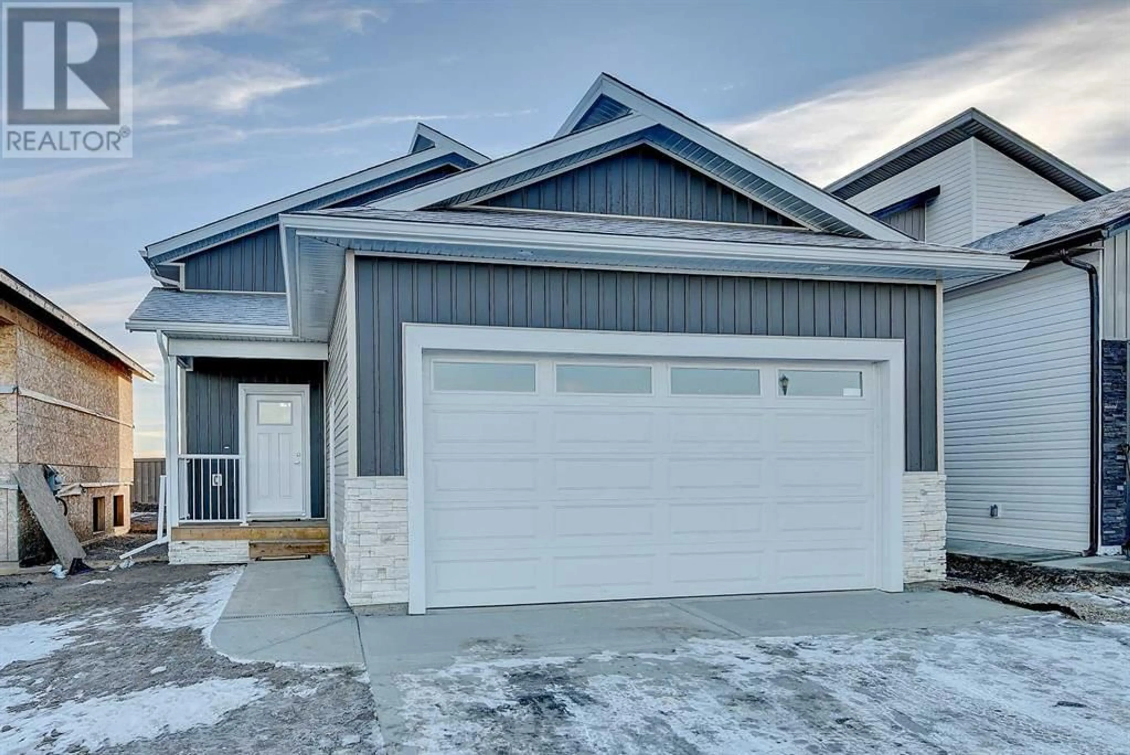A pic from exterior of the house or condo for 9095 80 Avenue, Grande Prairie Alberta T8X0W3