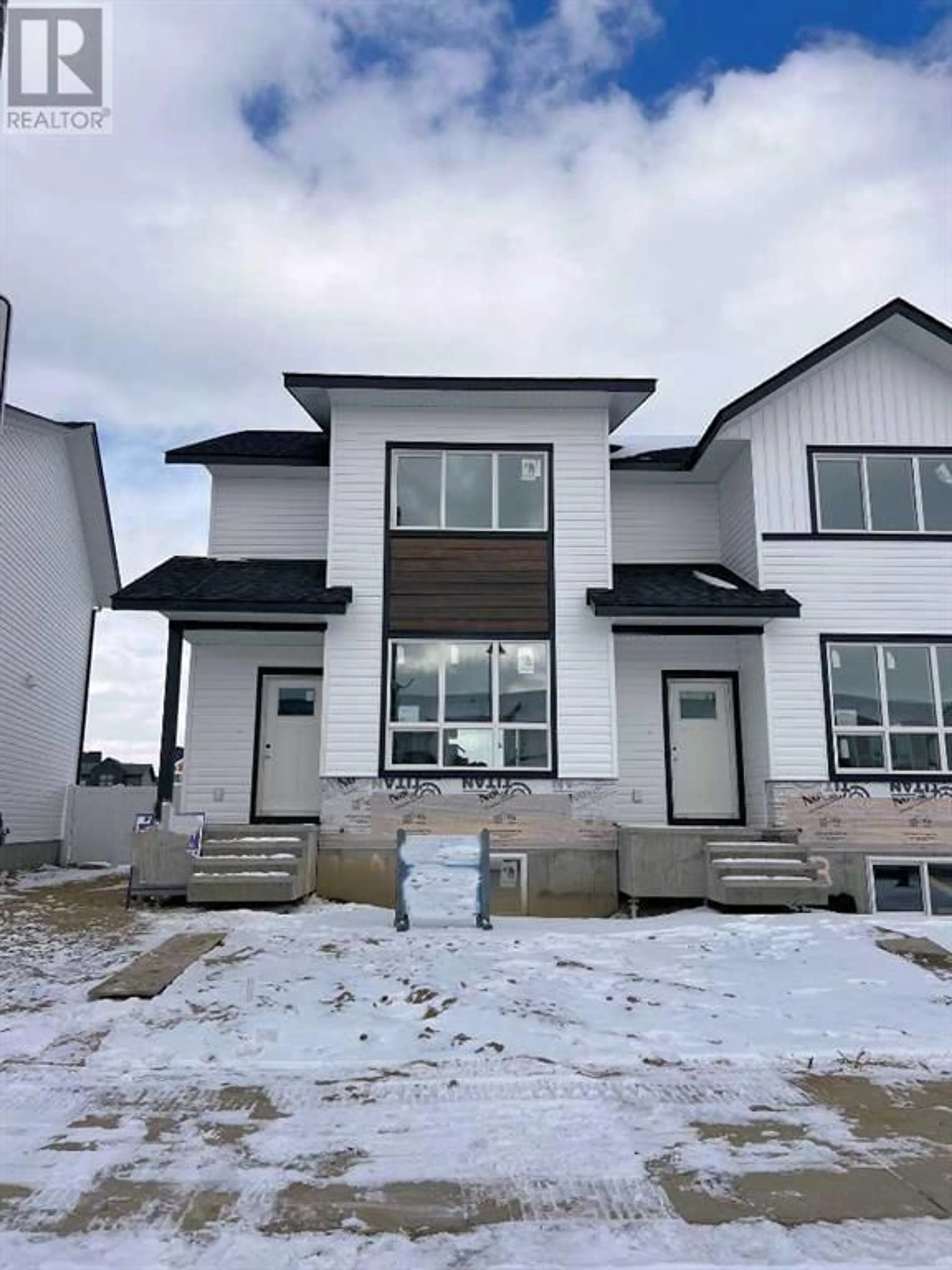 Frontside or backside of a home for 10 A Evergreen Way, Red Deer Alberta T4P3H1