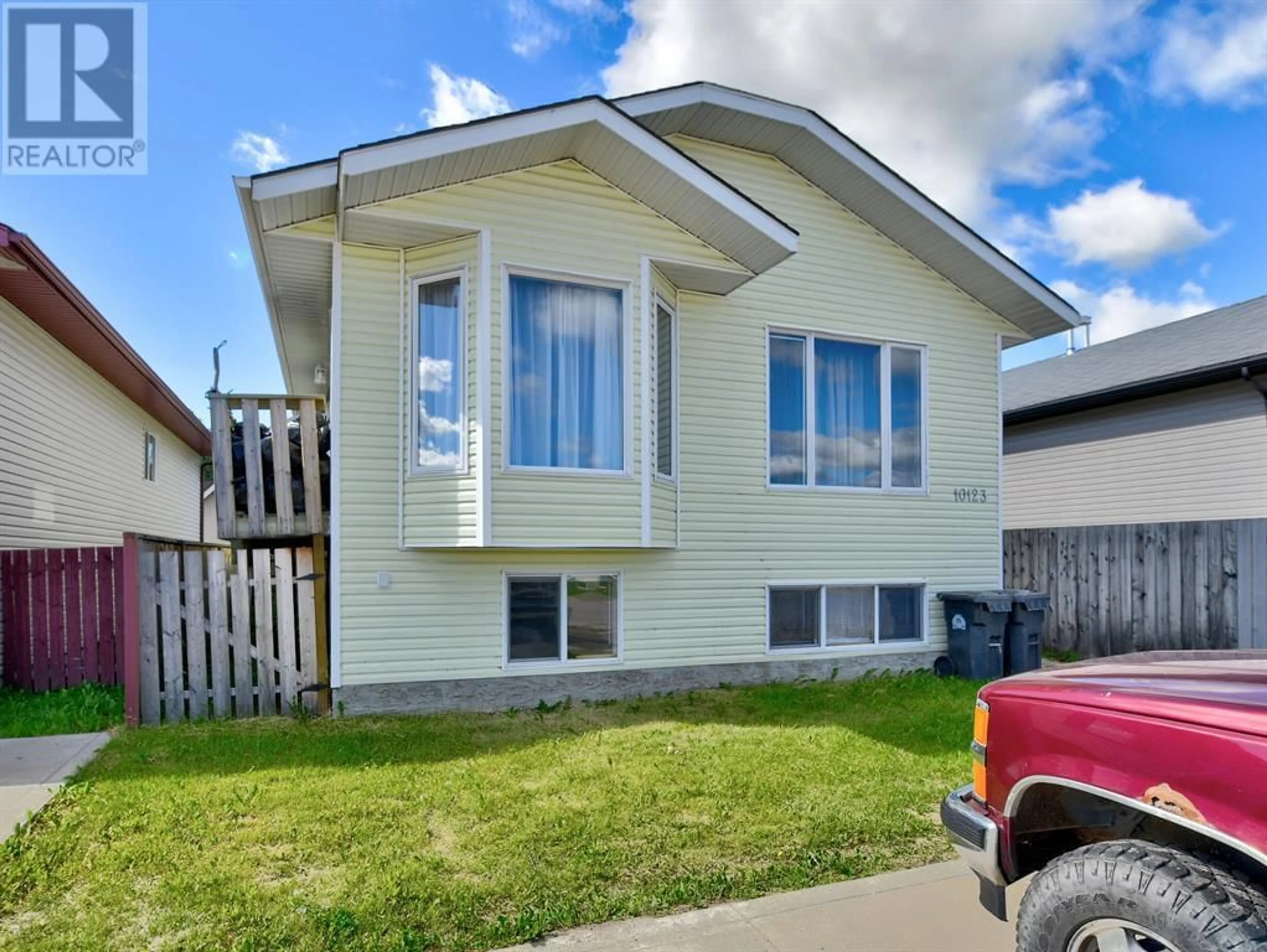 Frontside or backside of a home for 10123 98A Street, Sexsmith Alberta T0H3C0