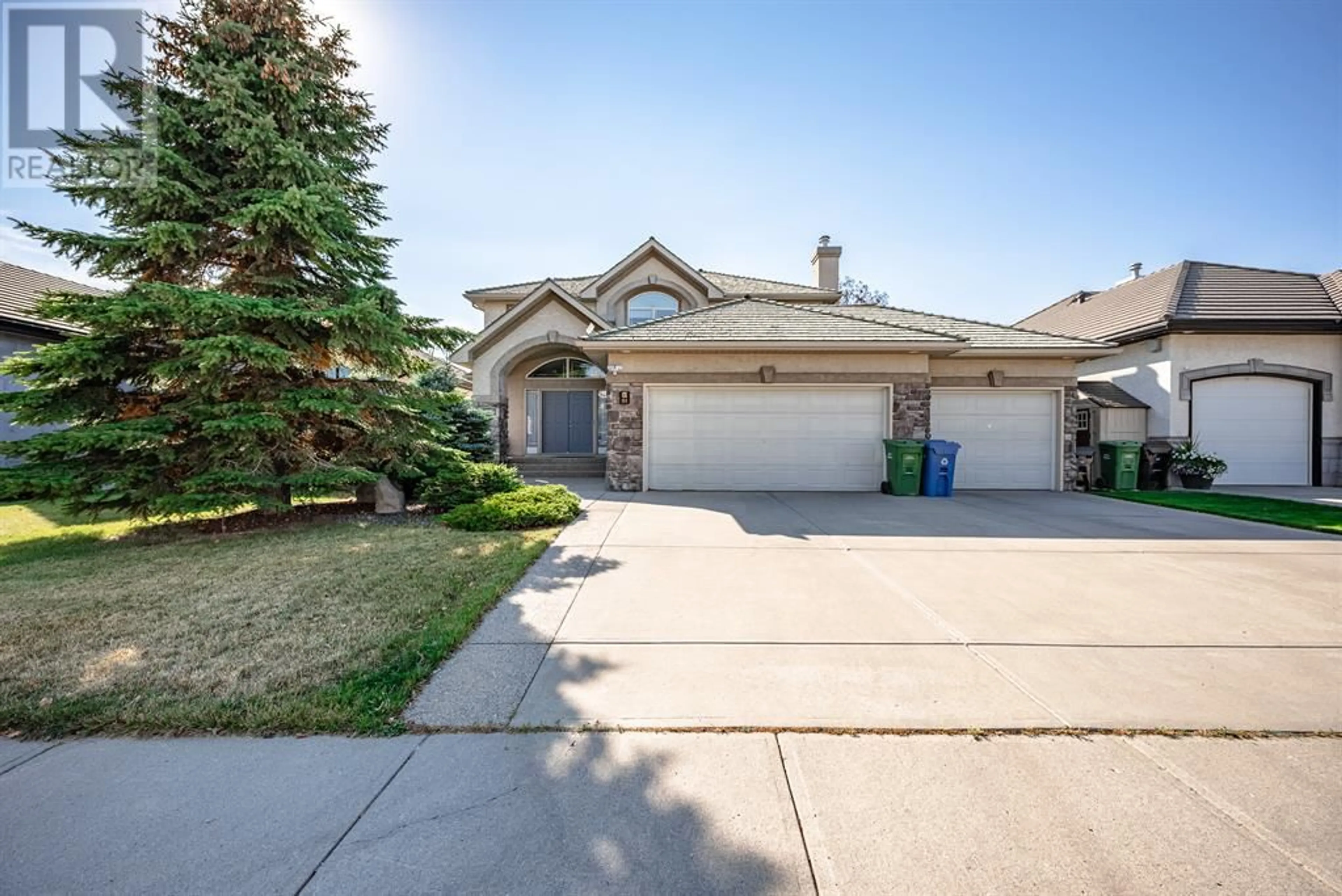 Frontside or backside of a home for 61 Arbour Vista Road NW, Calgary Alberta T3G4N9