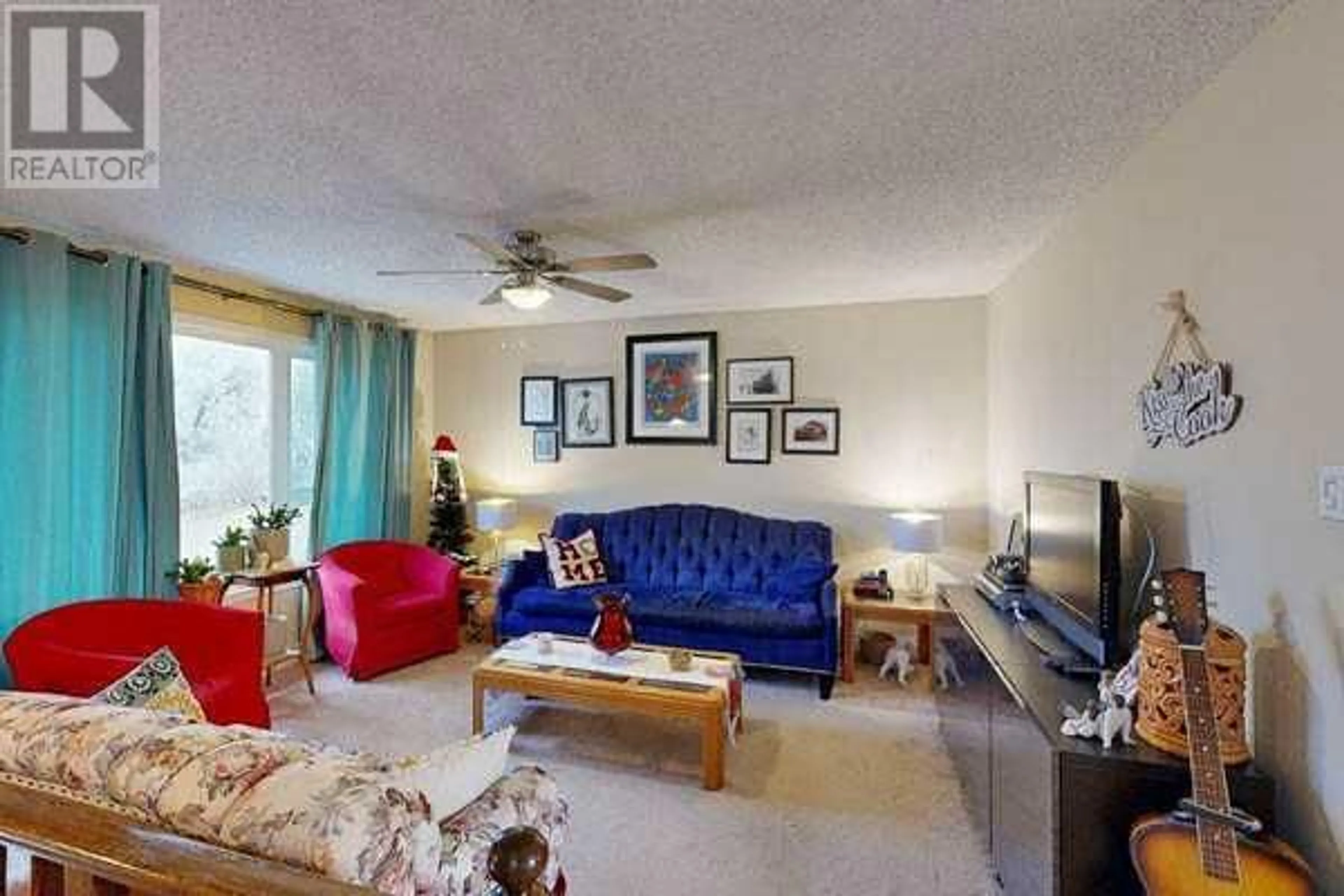 Living room for 313 54 Avenue E, Claresholm Alberta T0L0T0