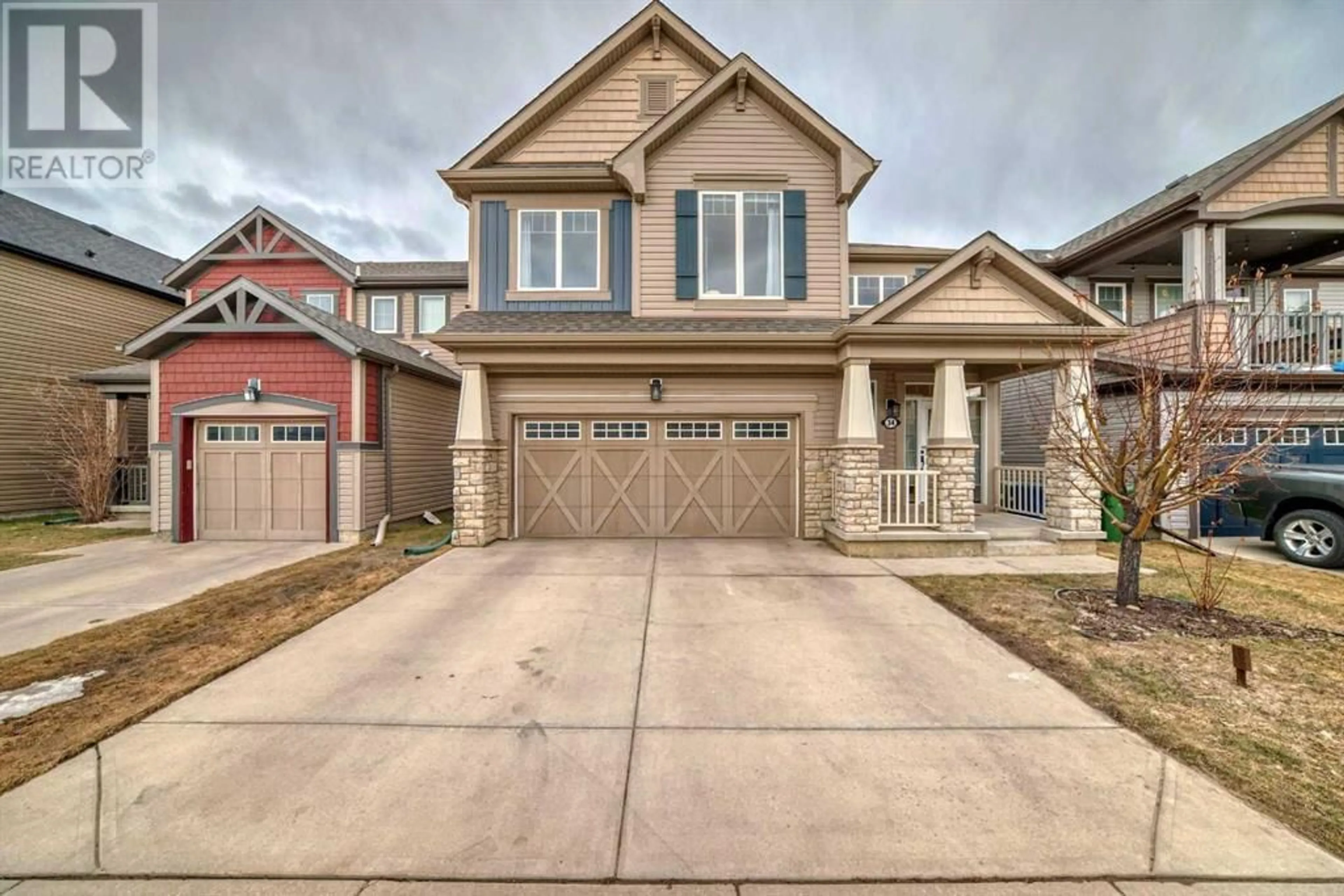 Frontside or backside of a home for 34 Windcreek Terrace SW, Airdrie Alberta T4B0Y4