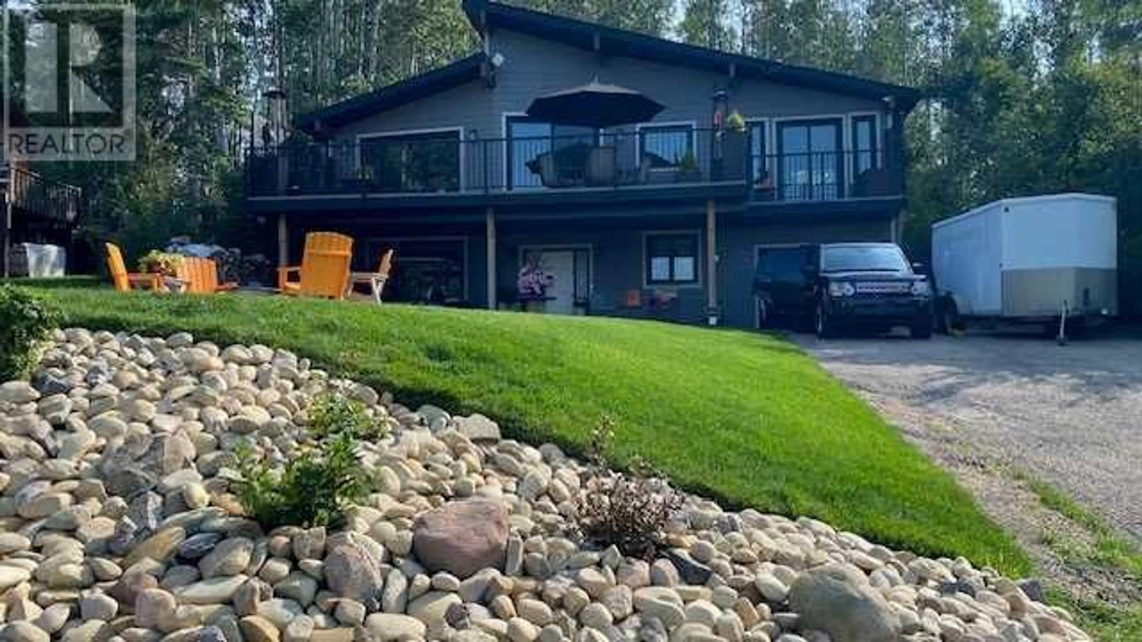A pic from exterior of the house or condo for 711 Elk Street, Sunbreaker Cove Alberta T0C0J0
