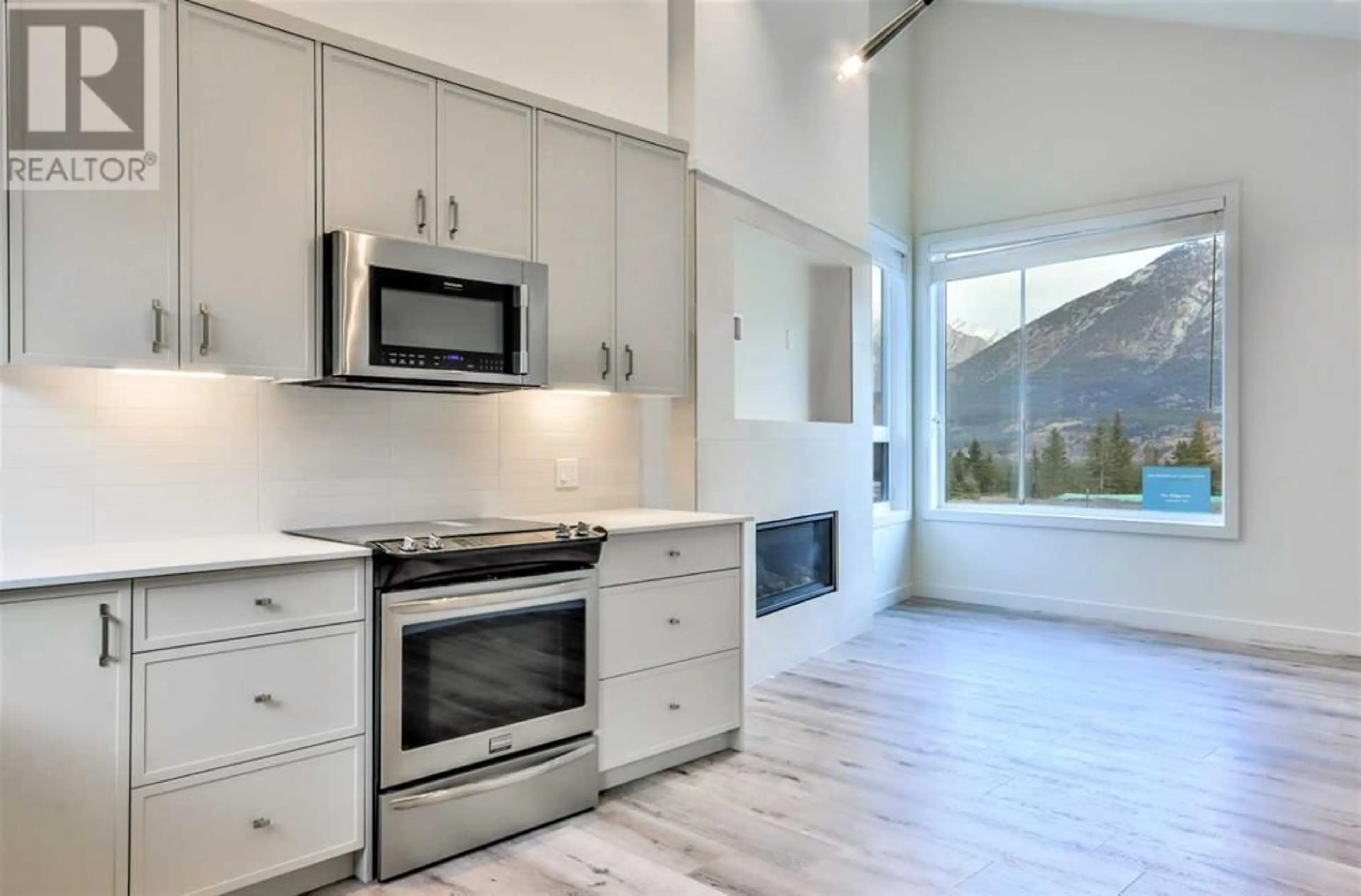 Contemporary kitchen for 64 209 Stewart Creek Rise, Canmore Alberta T1W0N9