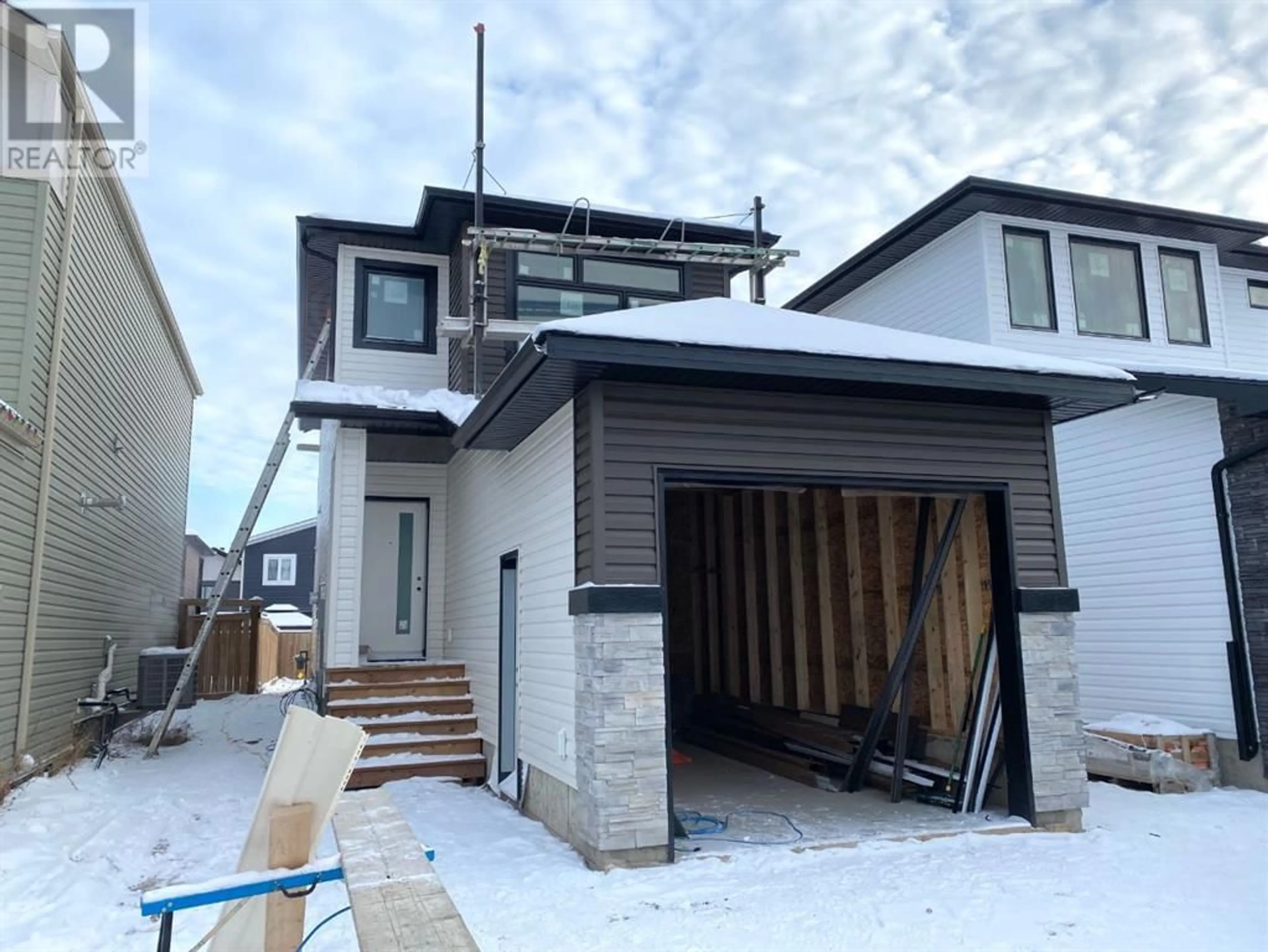 Frontside or backside of a home for 145 Athabasca Crescent, Fort McMurray Alberta T9J1C3