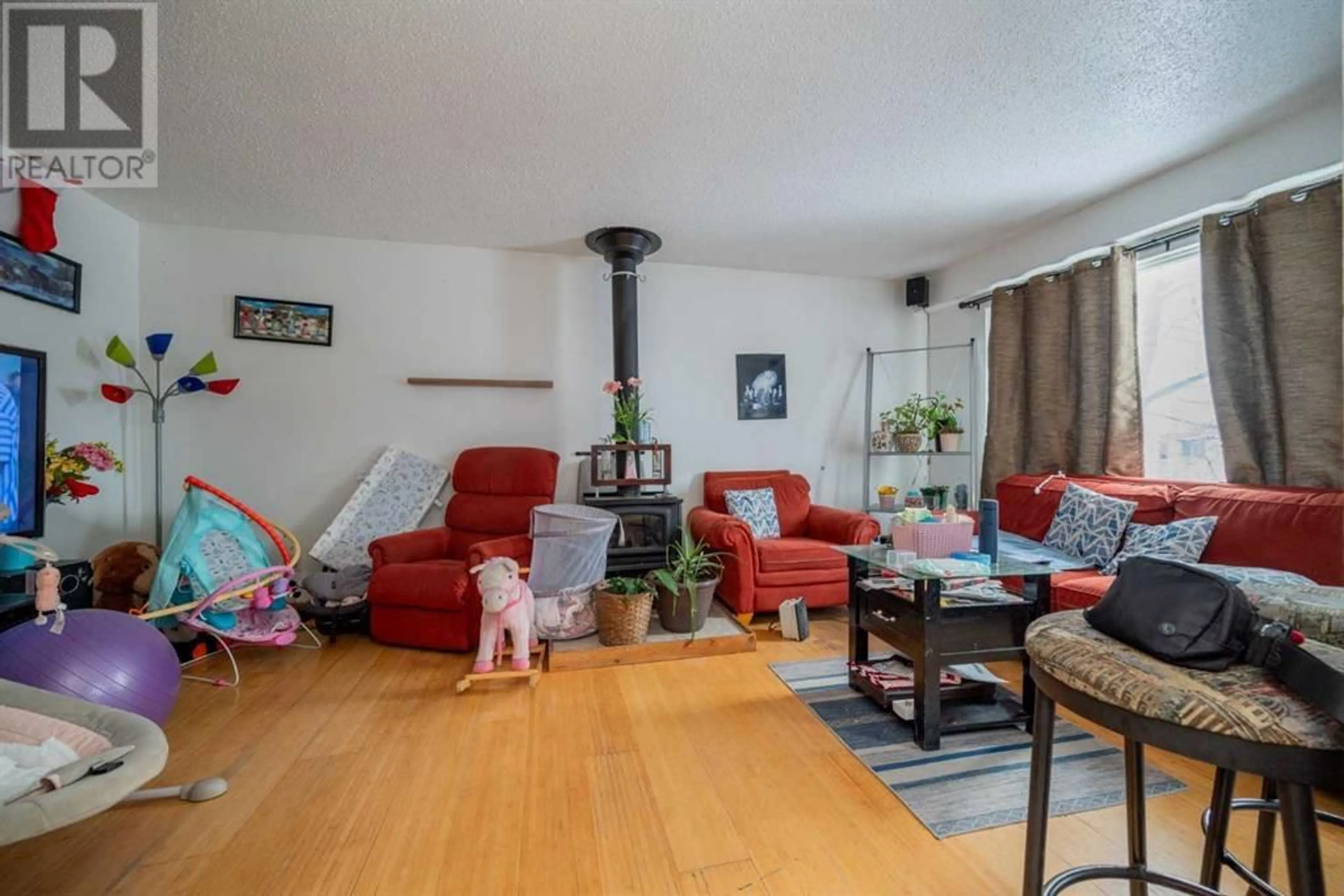 Living room for 10120 110 Avenue, Grande Prairie Alberta T8V1S6