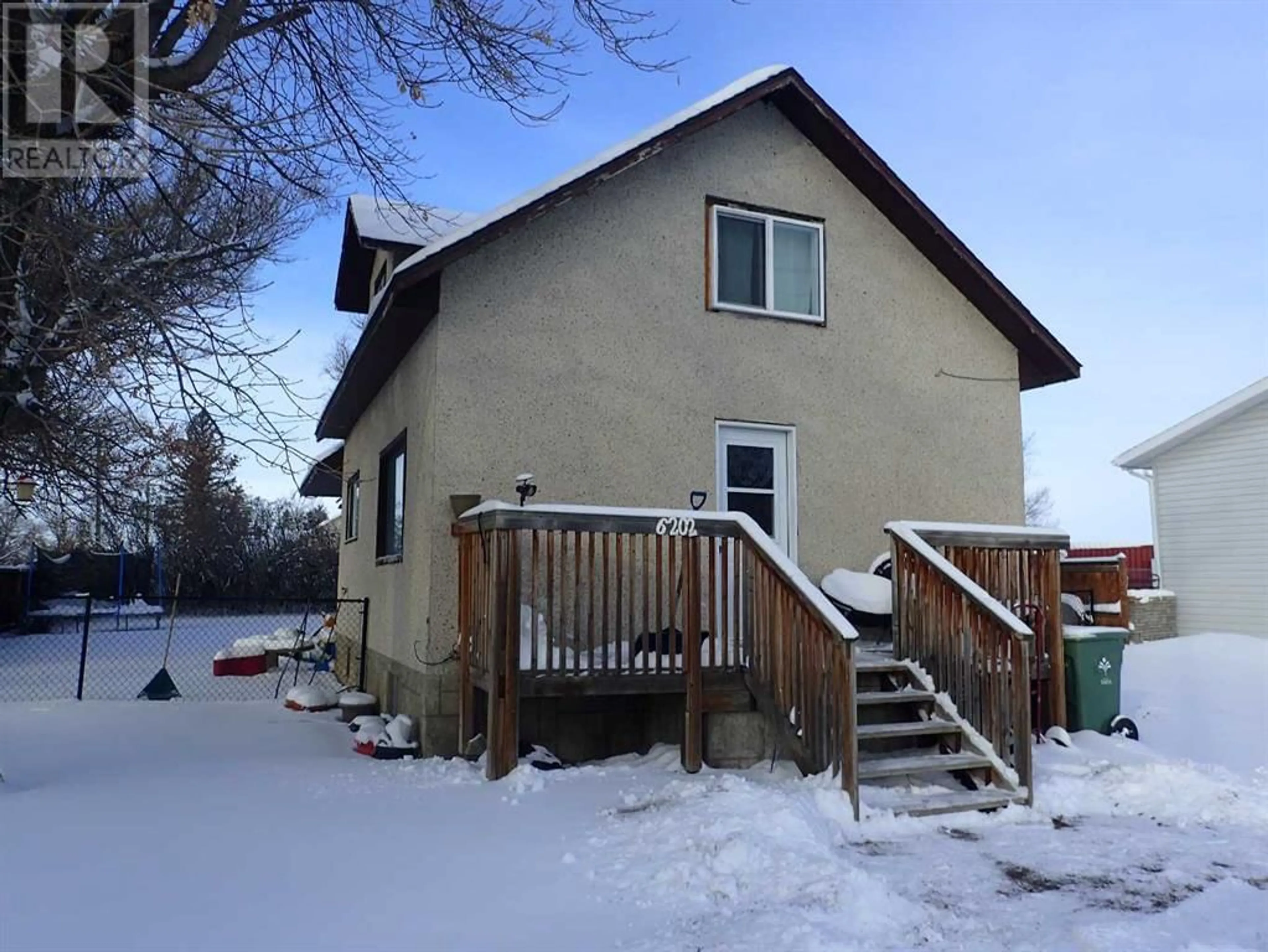 Frontside or backside of a home for 6202 50 Street, Taber Alberta T1G1J5