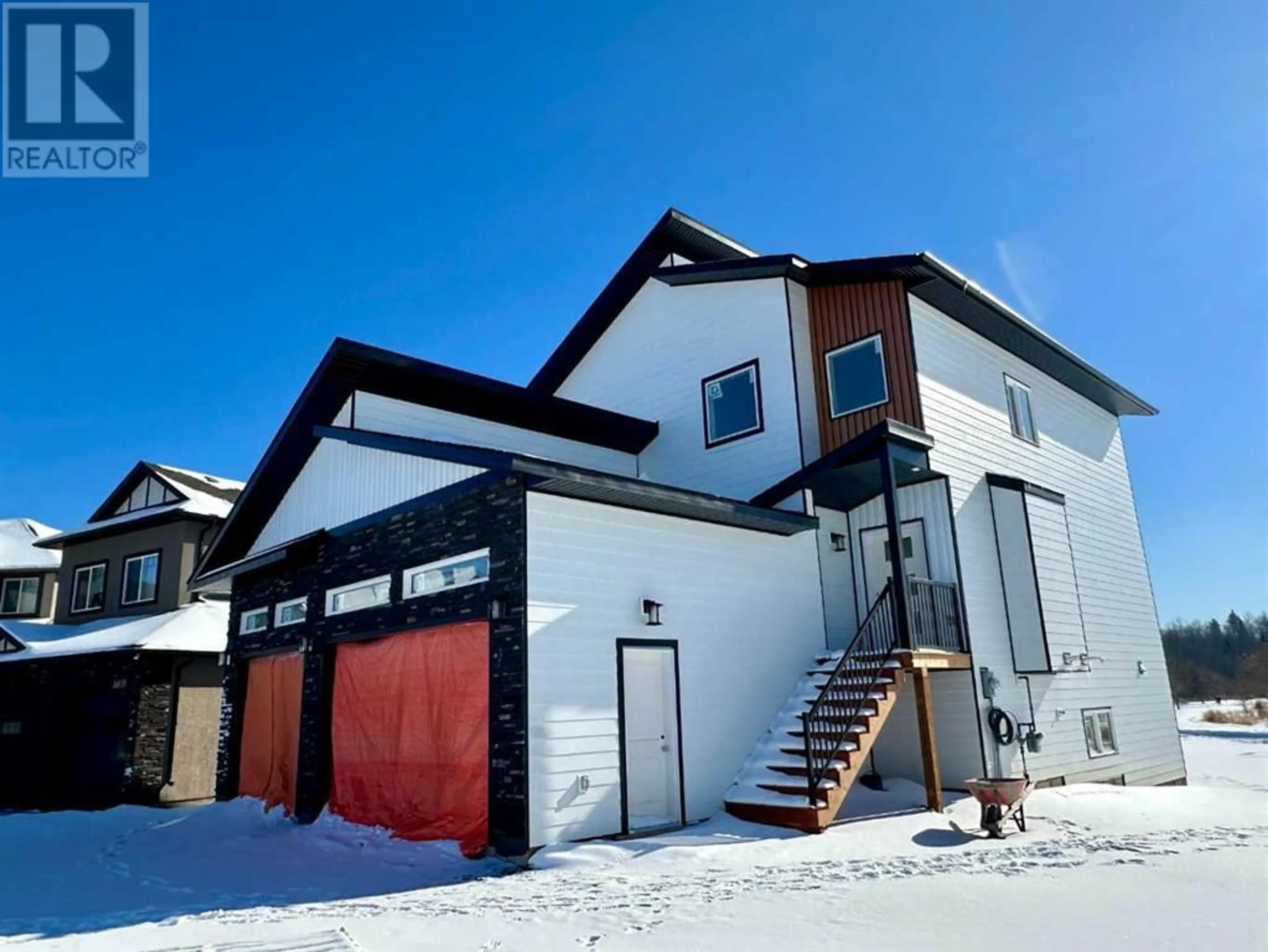 Frontside or backside of a home for 8805 59 Avenue, Grande Prairie Alberta T8W0J9