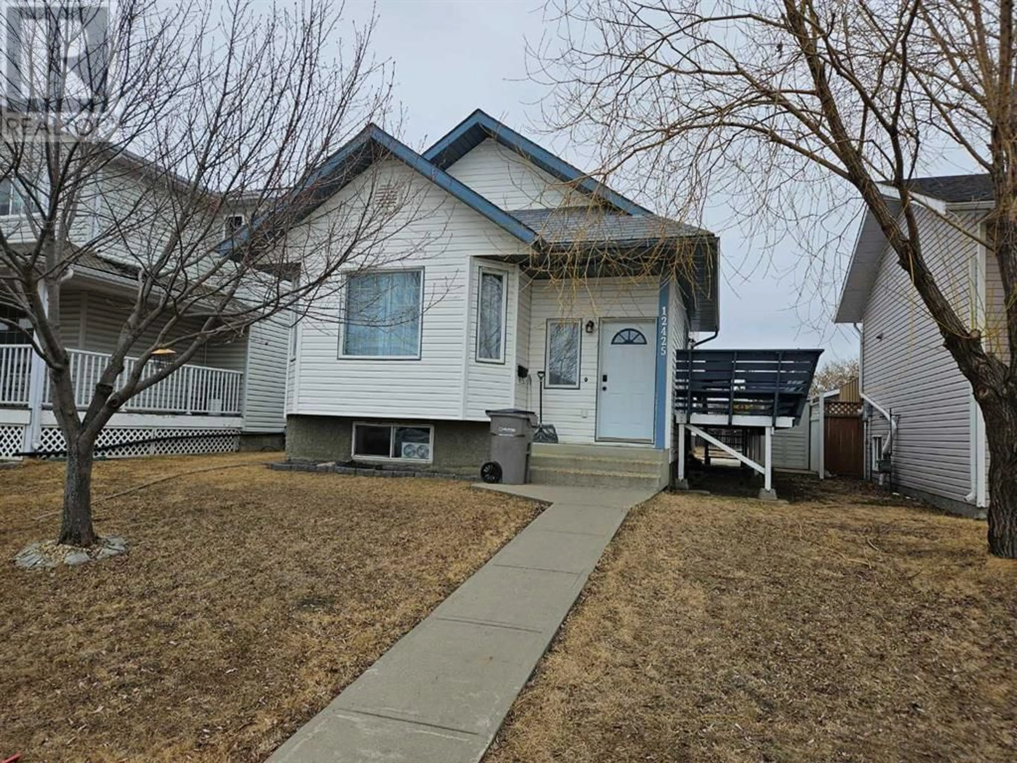 Frontside or backside of a home for 12425 97A Street, Grande Prairie Alberta T8V7H5