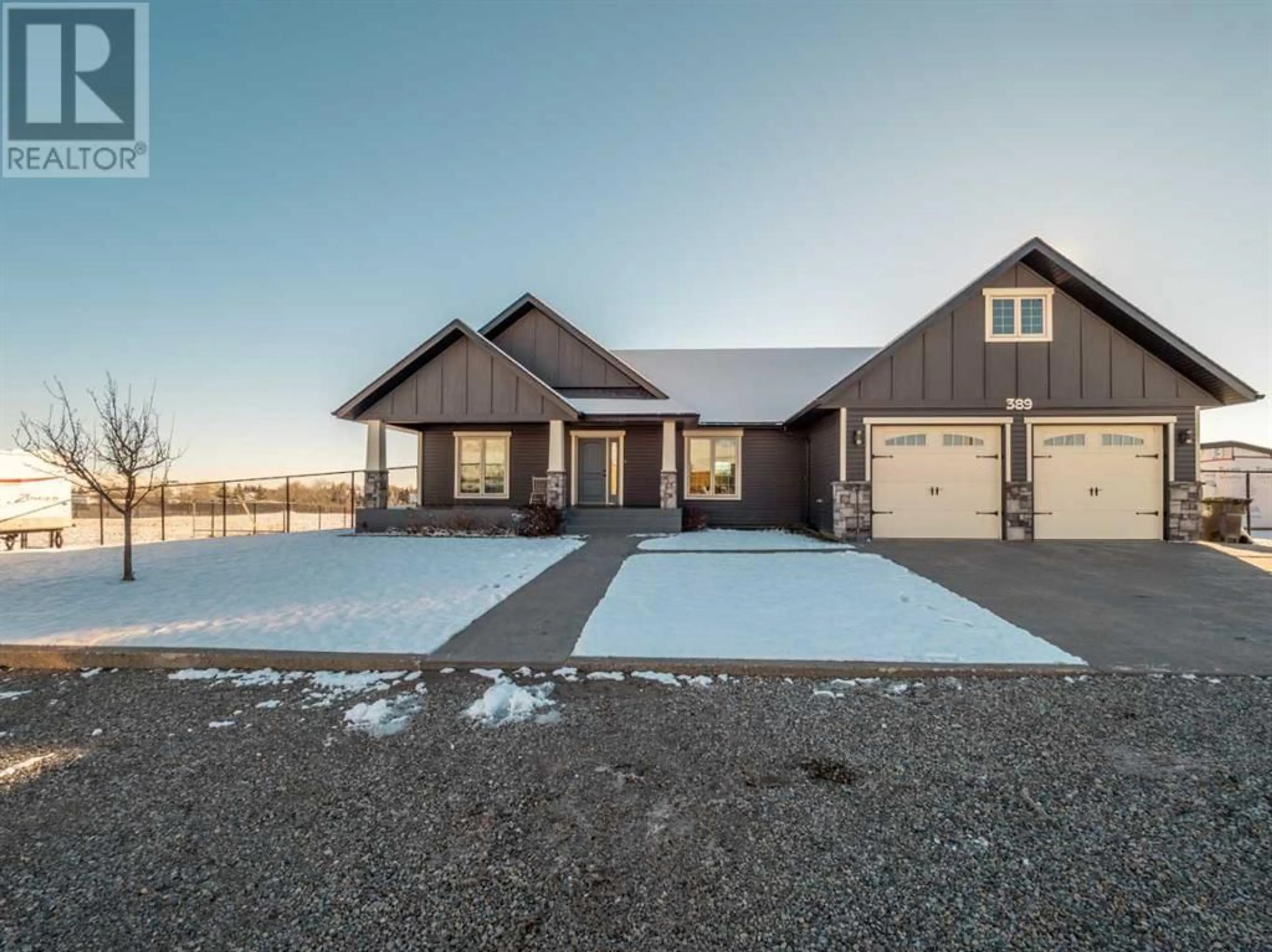 Home with stone exterior material for 389 Foxborough Lane, Pincher Creek Alberta T0K1W0