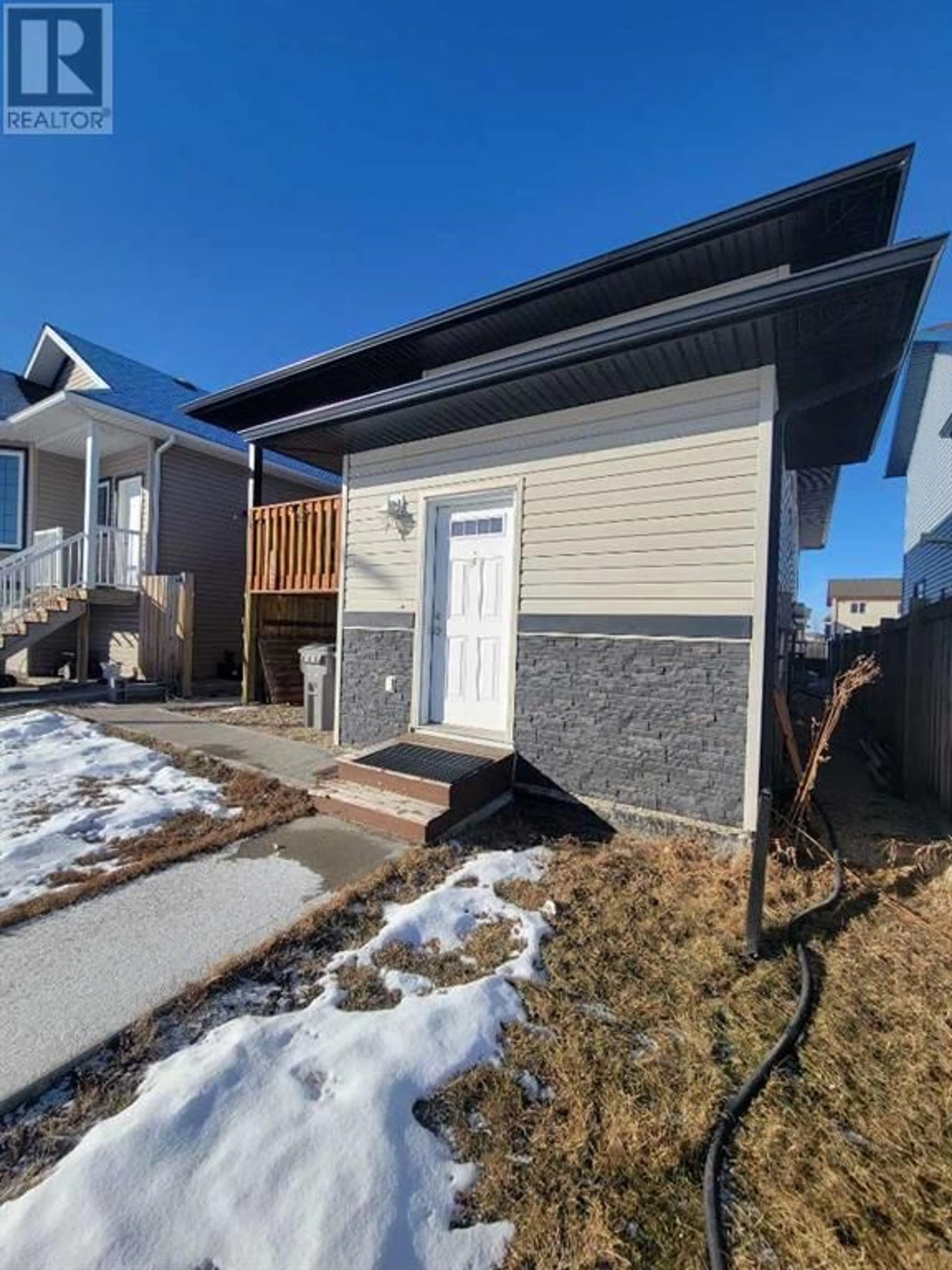 A pic from exterior of the house or condo for 11542 76 Avenue, Grande Prairie Alberta T8W0B6