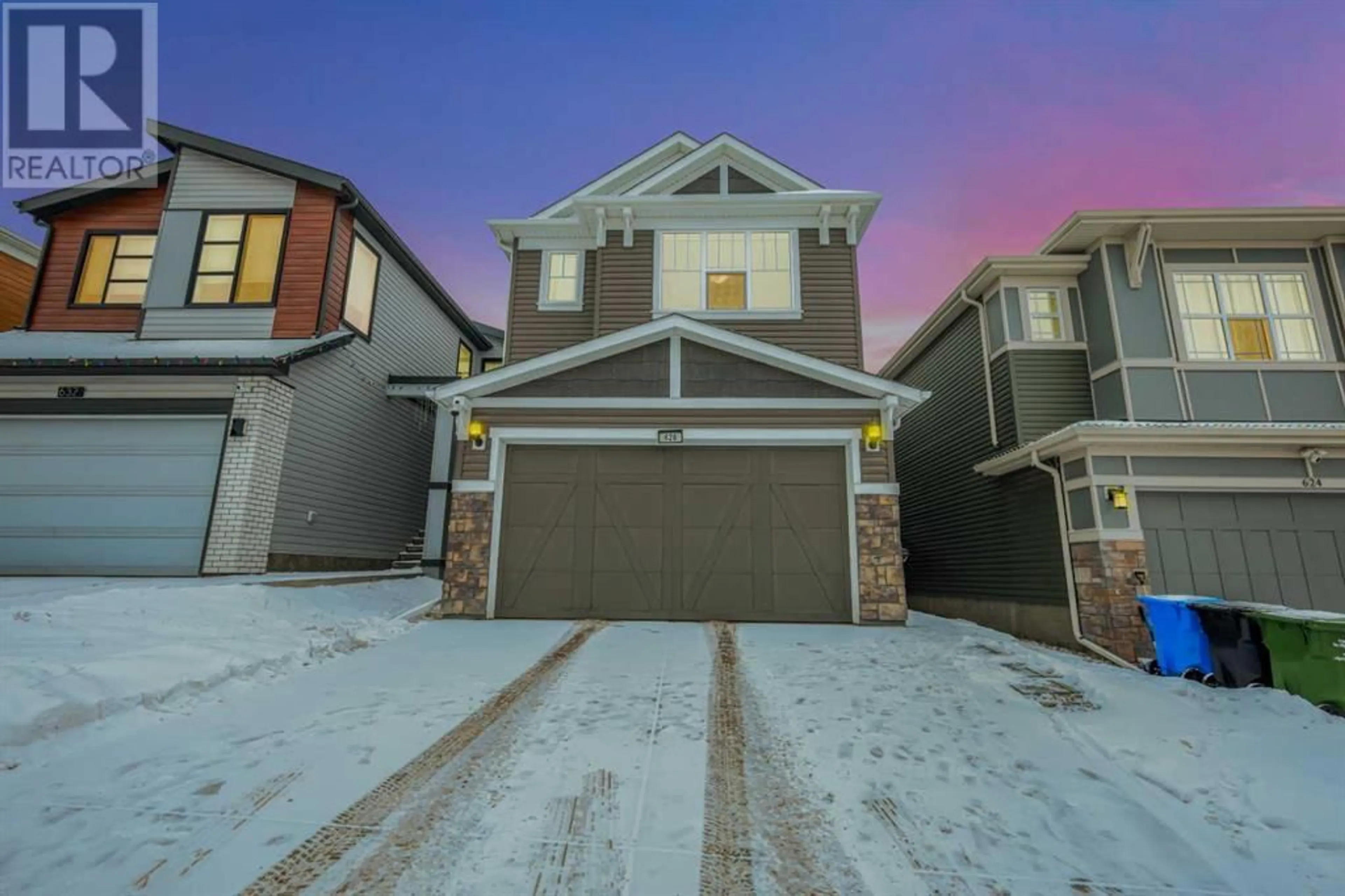 Frontside or backside of a home for 628 Livingston Way NE, Calgary Alberta T3P1R8