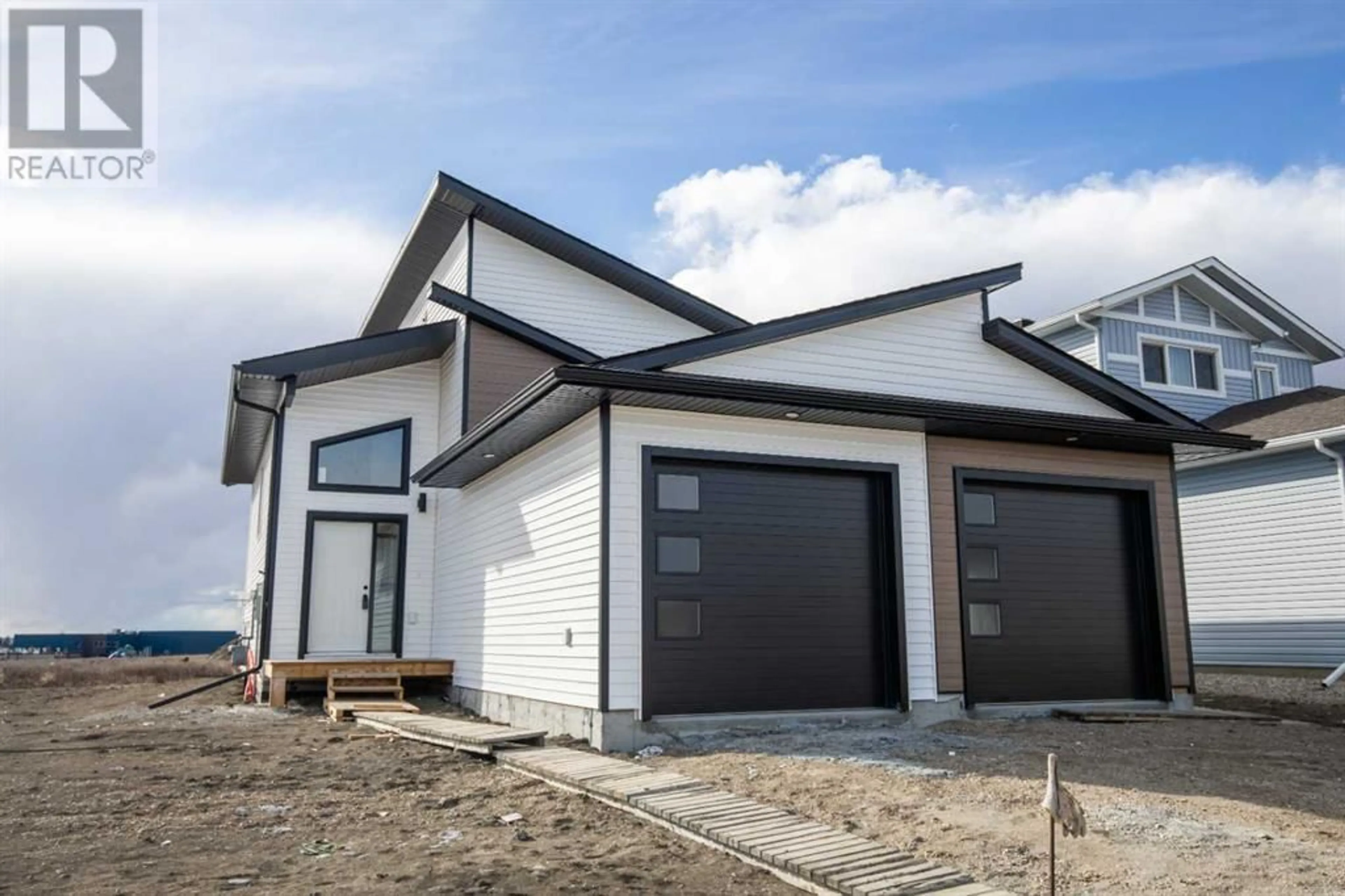 Frontside or backside of a home for 12914 102a Street, Grande Prairie Alberta T8V6K9