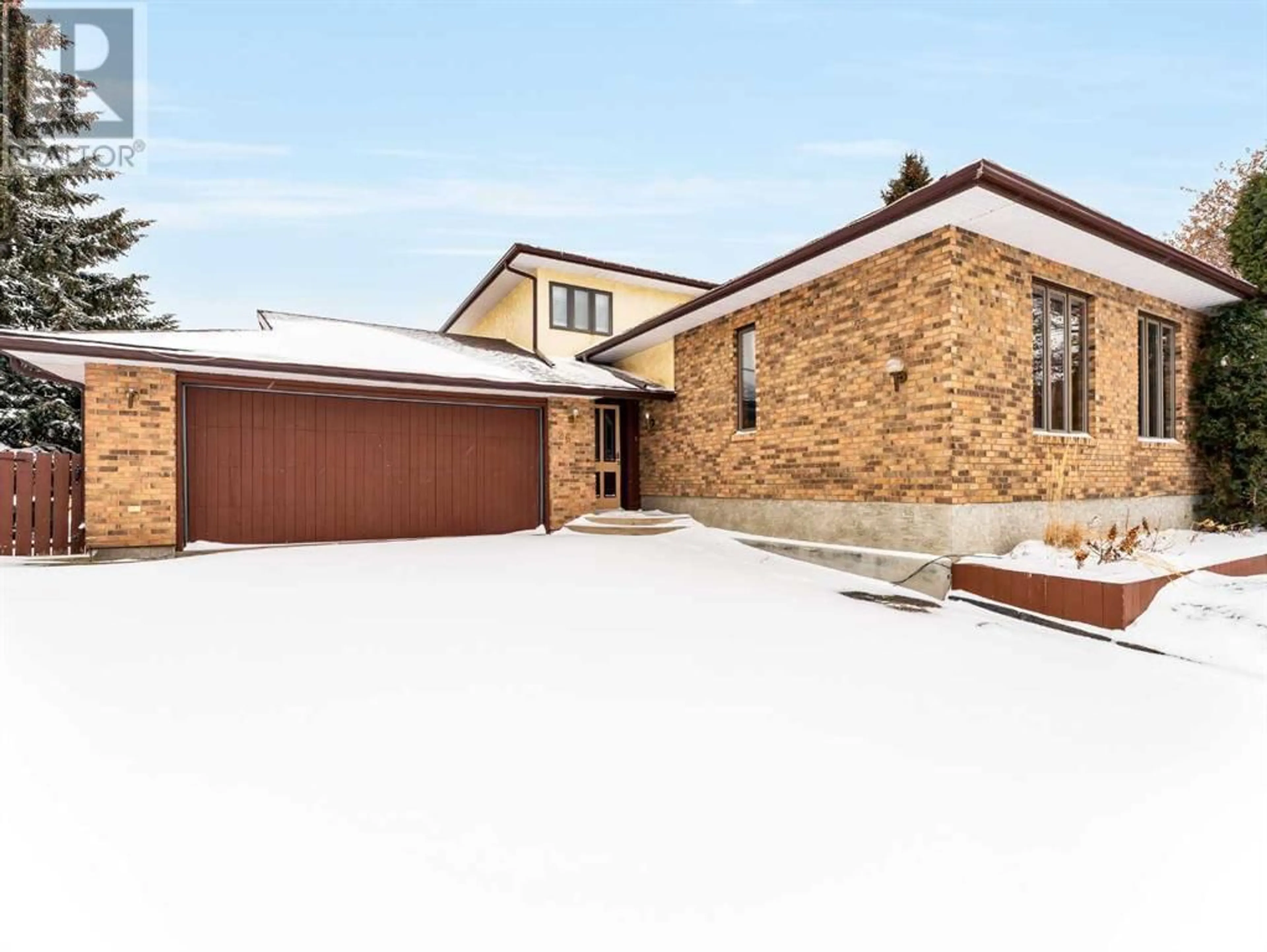 Home with brick exterior material for 26 Carry Place SE, Medicine Hat Alberta T1B3Y2