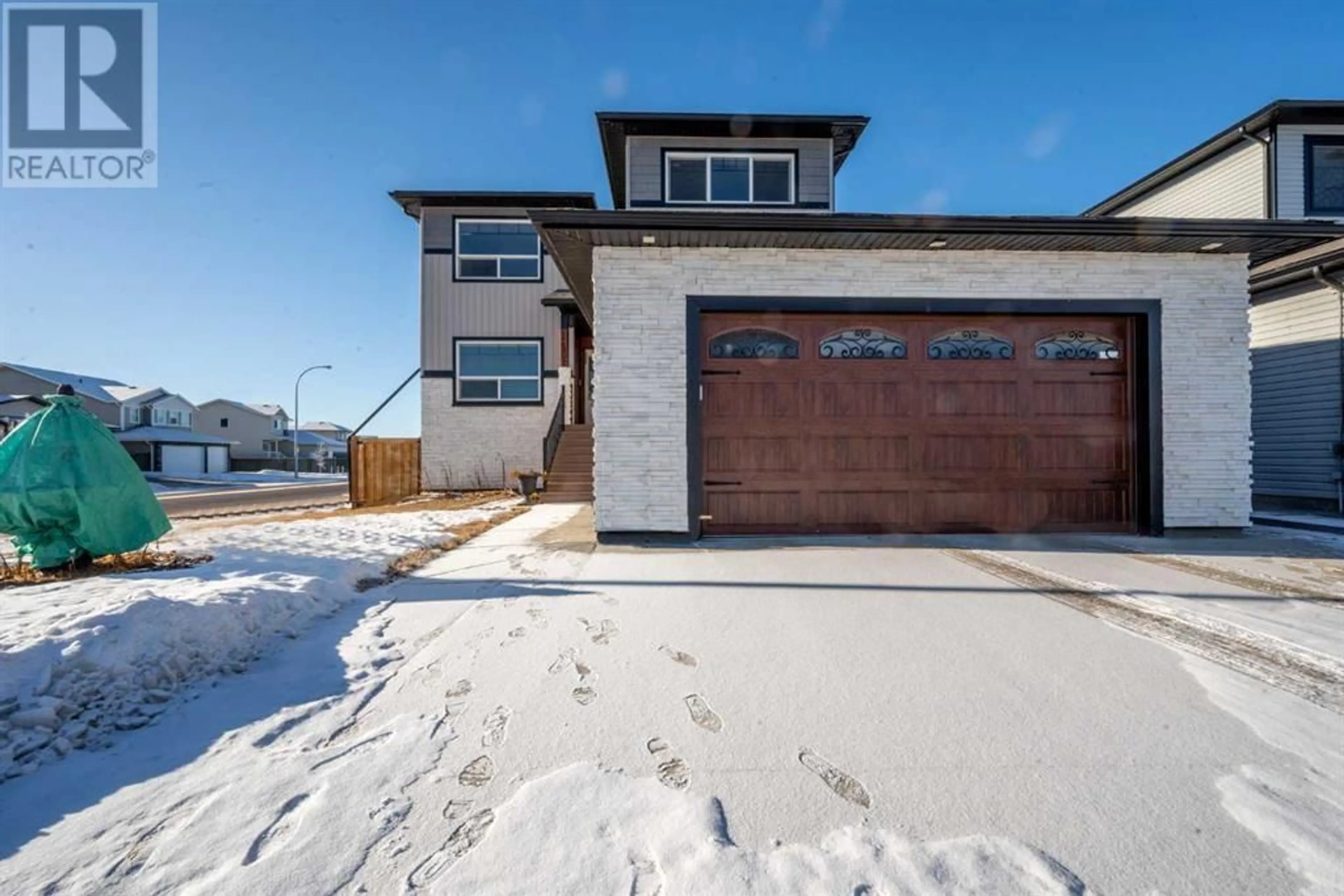 Frontside or backside of a home for 12802 Royal Boulevard, Grande Prairie Alberta T8V6J6