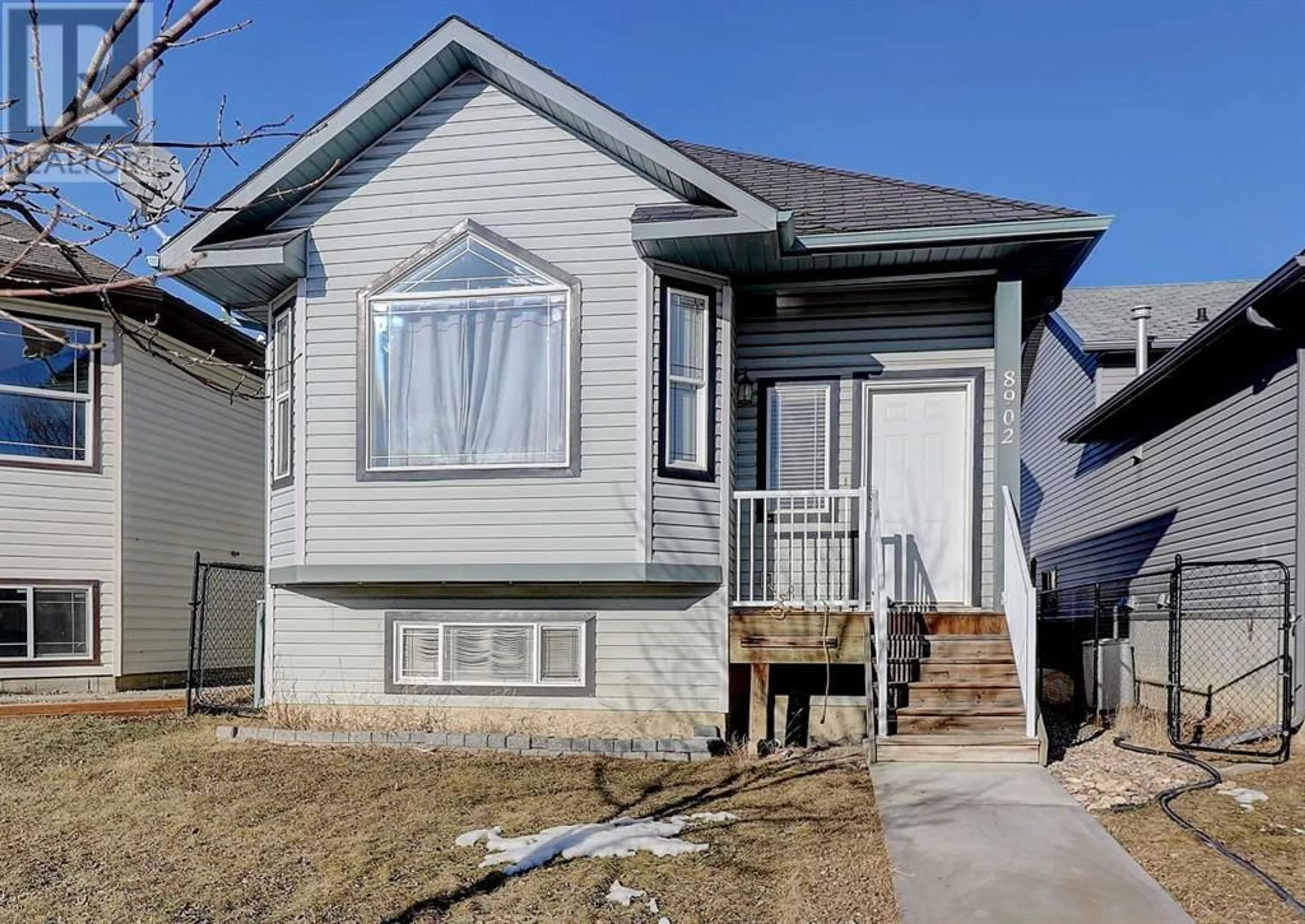Frontside or backside of a home for 8902 69 Avenue, Grande Prairie Alberta T8X0C1