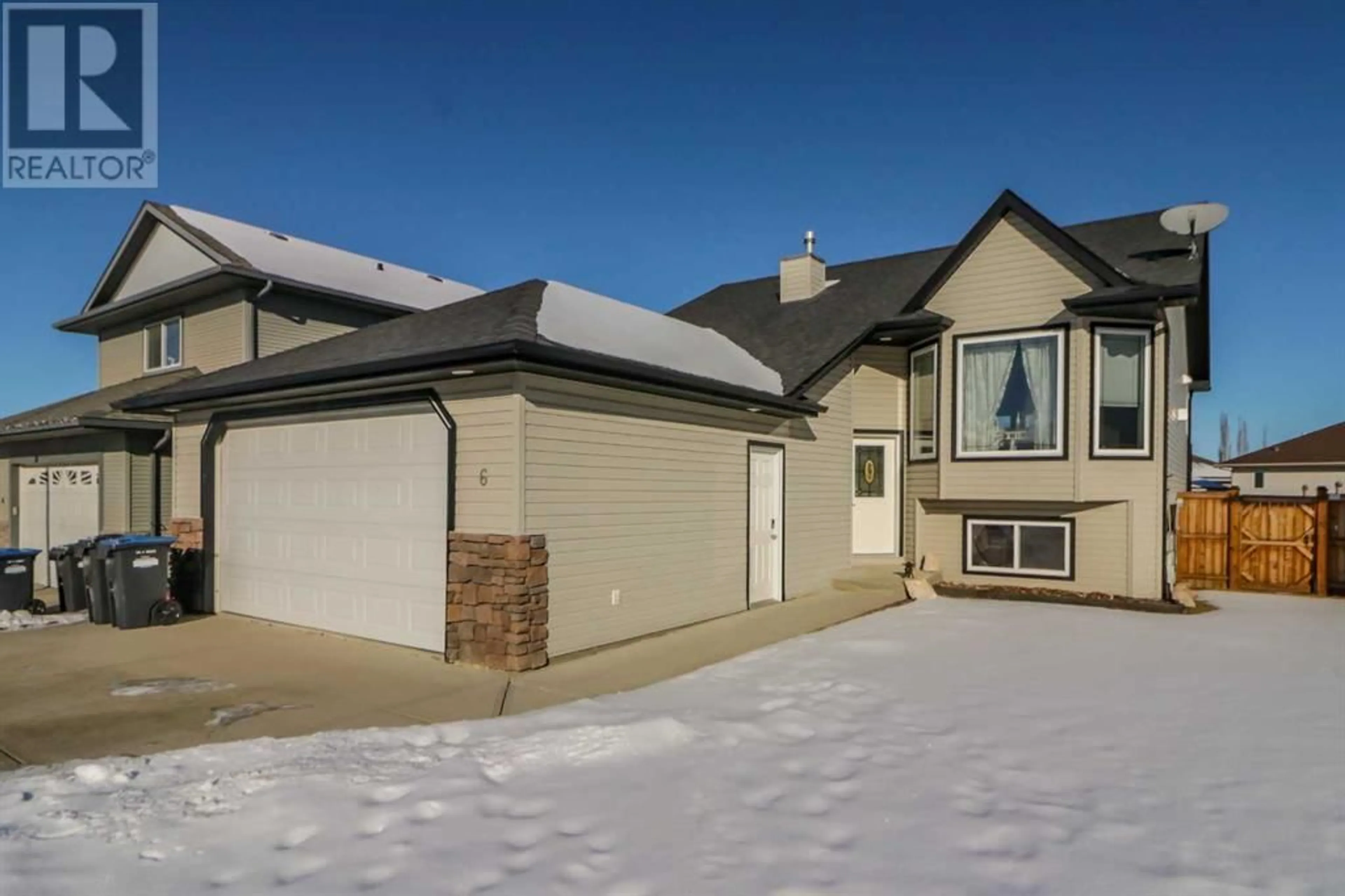 Frontside or backside of a home for 6 Lyon Cres. Crescent, Sylvan Lake Alberta T4S2M6