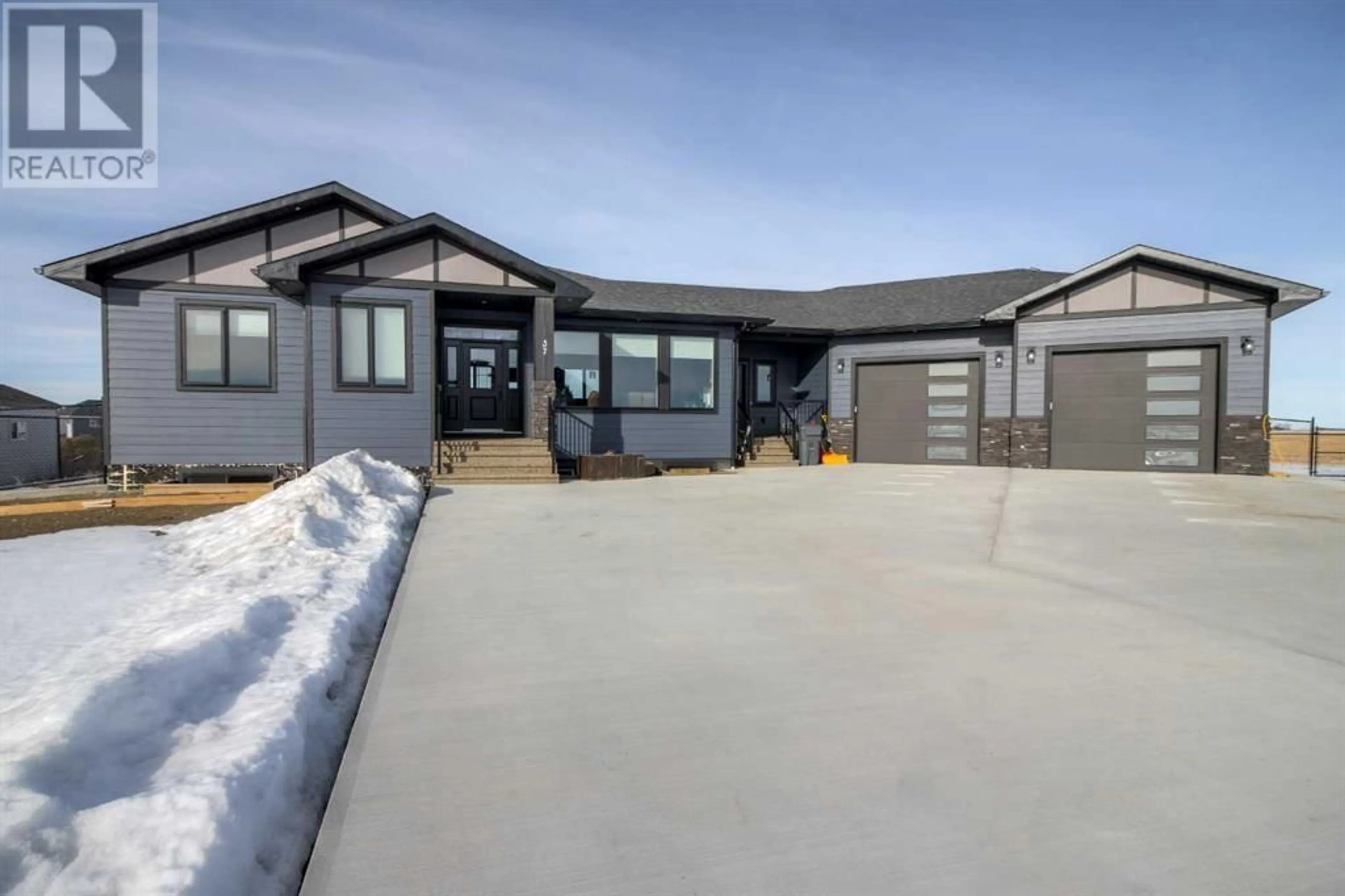Frontside or backside of a home for 37 Quarry Bank Road, Raymond Alberta T0K2S0