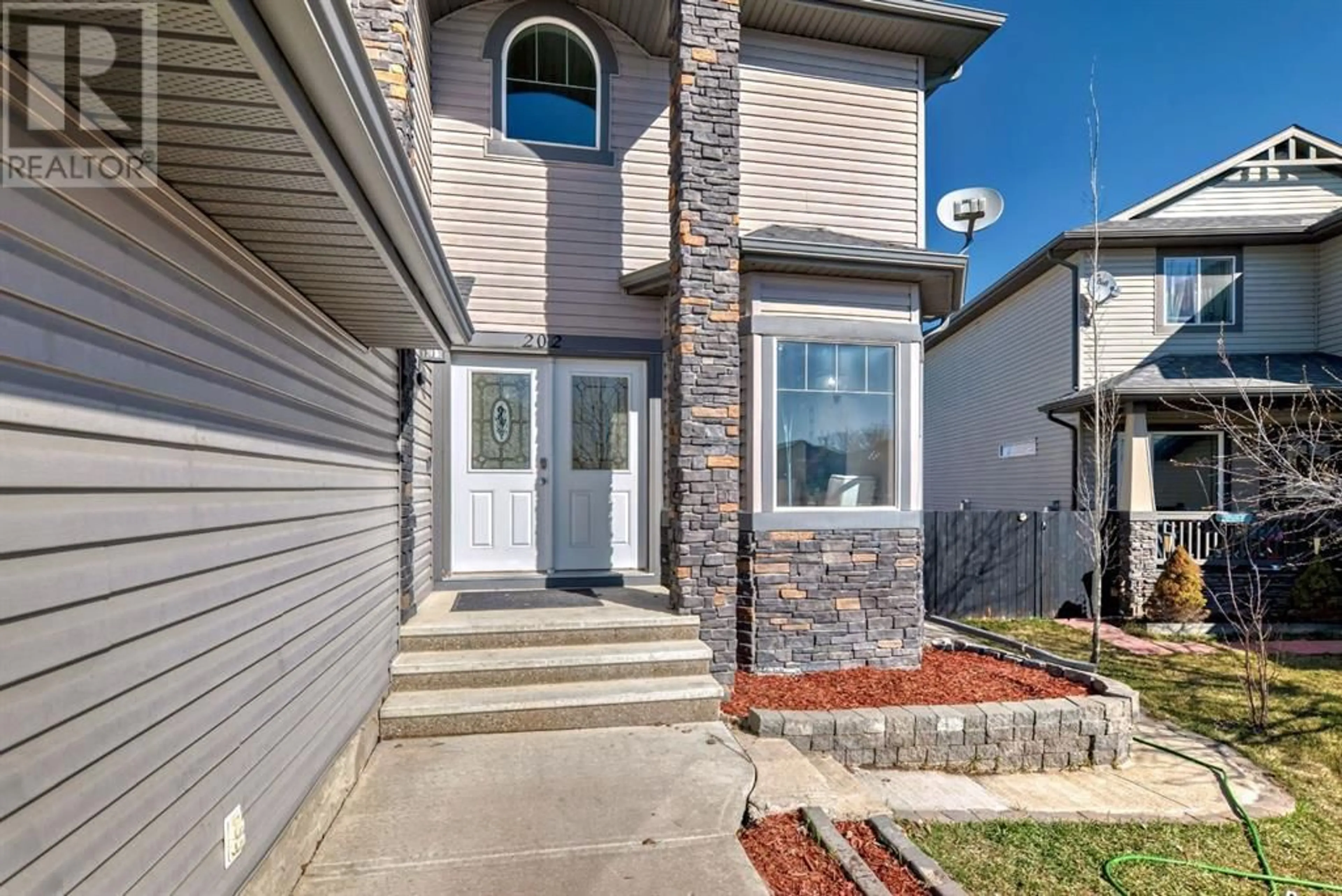 A pic from exterior of the house or condo for 202 TOPAZ Gate, Chestermere Alberta T1X0E5