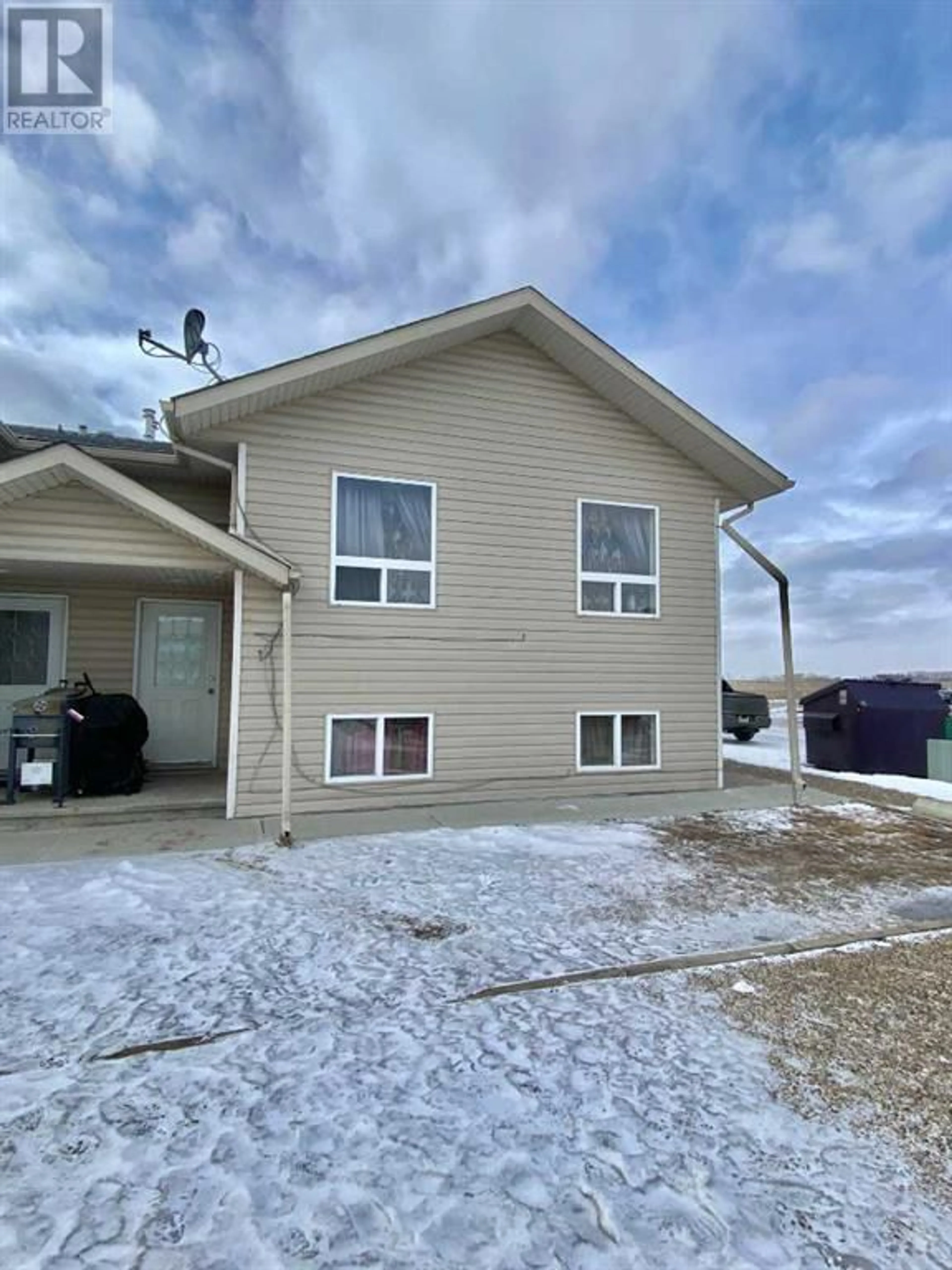 Home with unknown exterior material for 2 F 104 Upland Trail W, Brooks Alberta T1R1L6