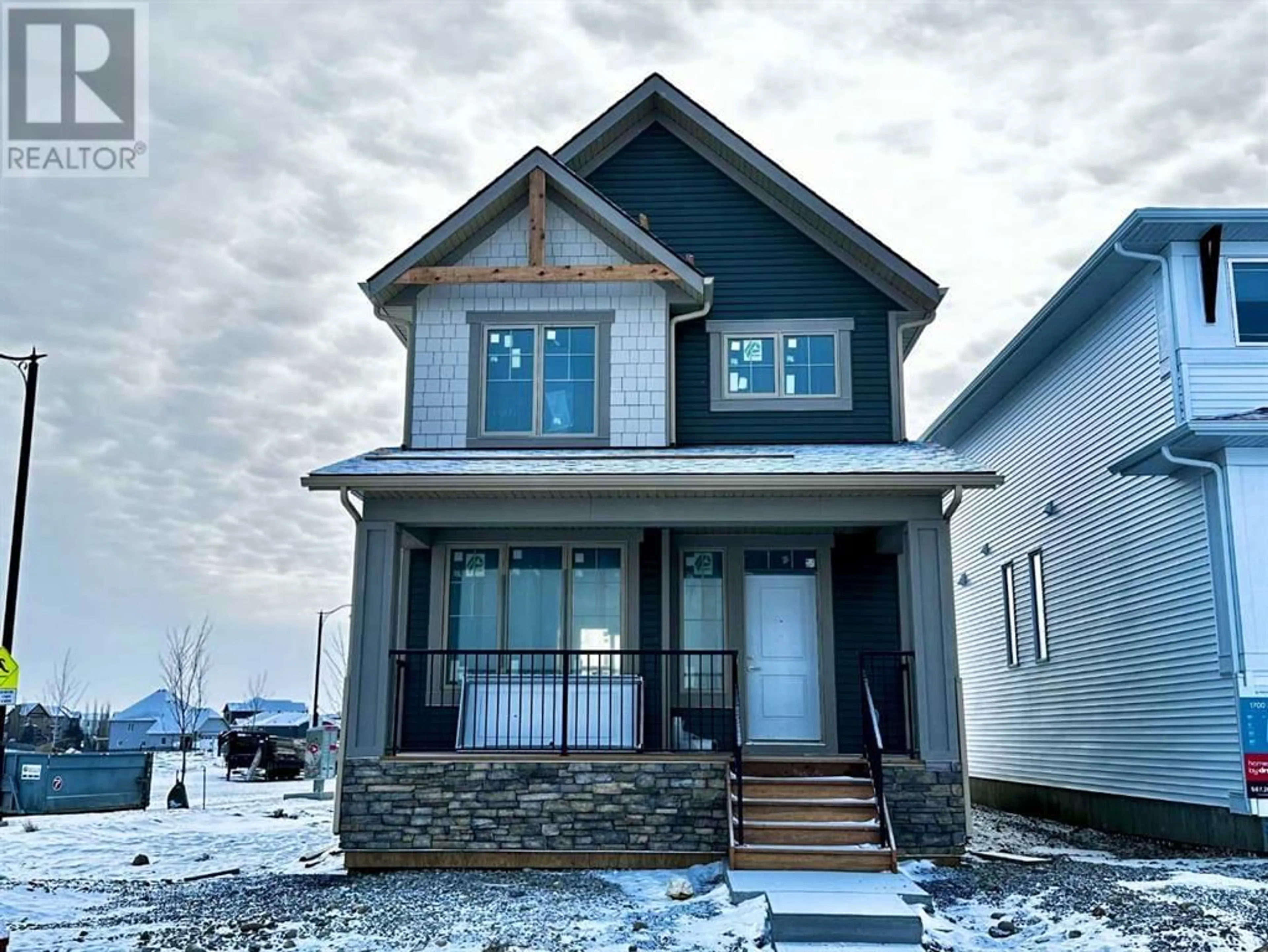 Frontside or backside of a home for 1700 3 Street SE, High River Alberta T1V0K4