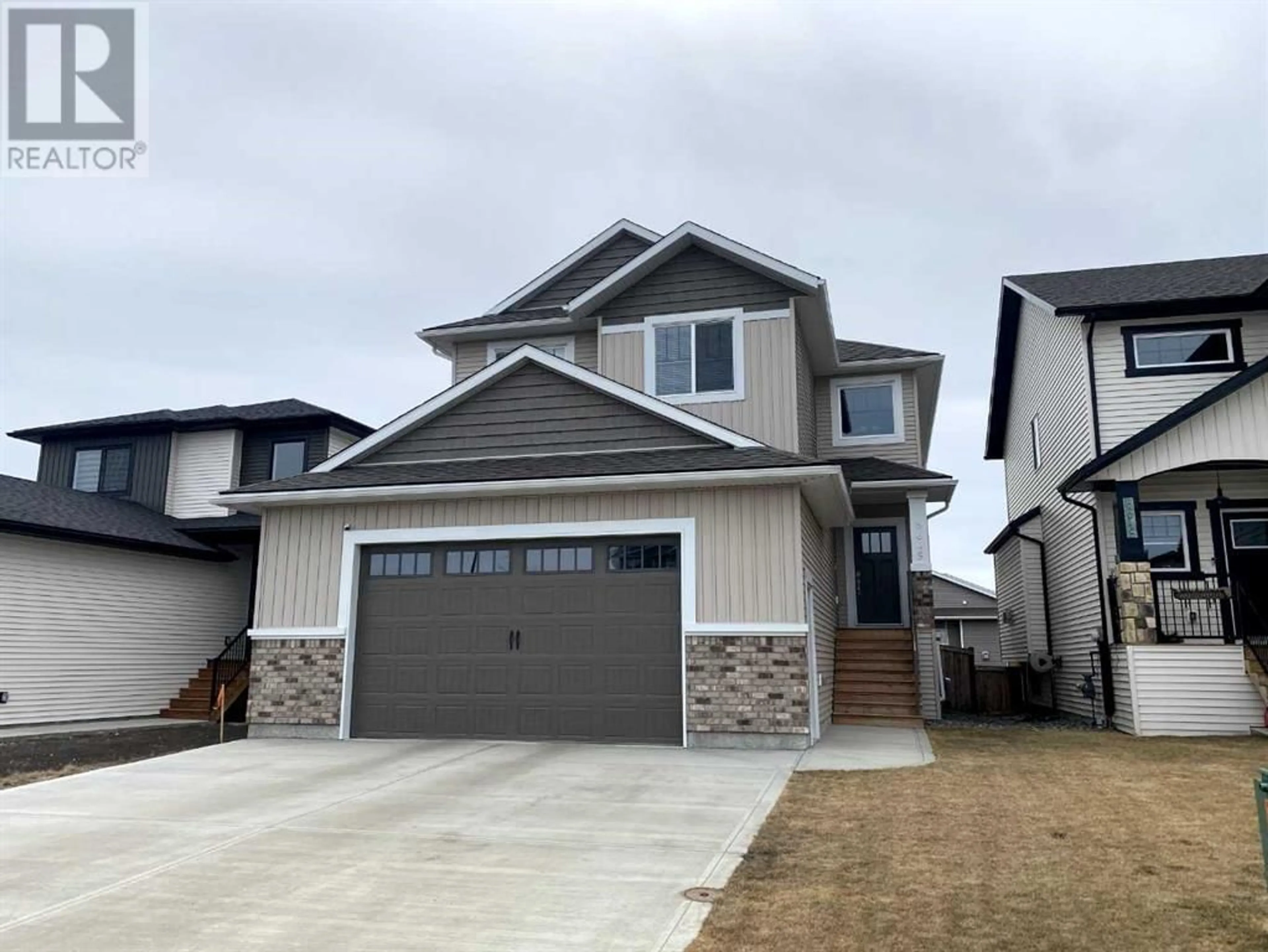 Frontside or backside of a home for 8645 121 Avenue, Grande Prairie Alberta T8X0H5