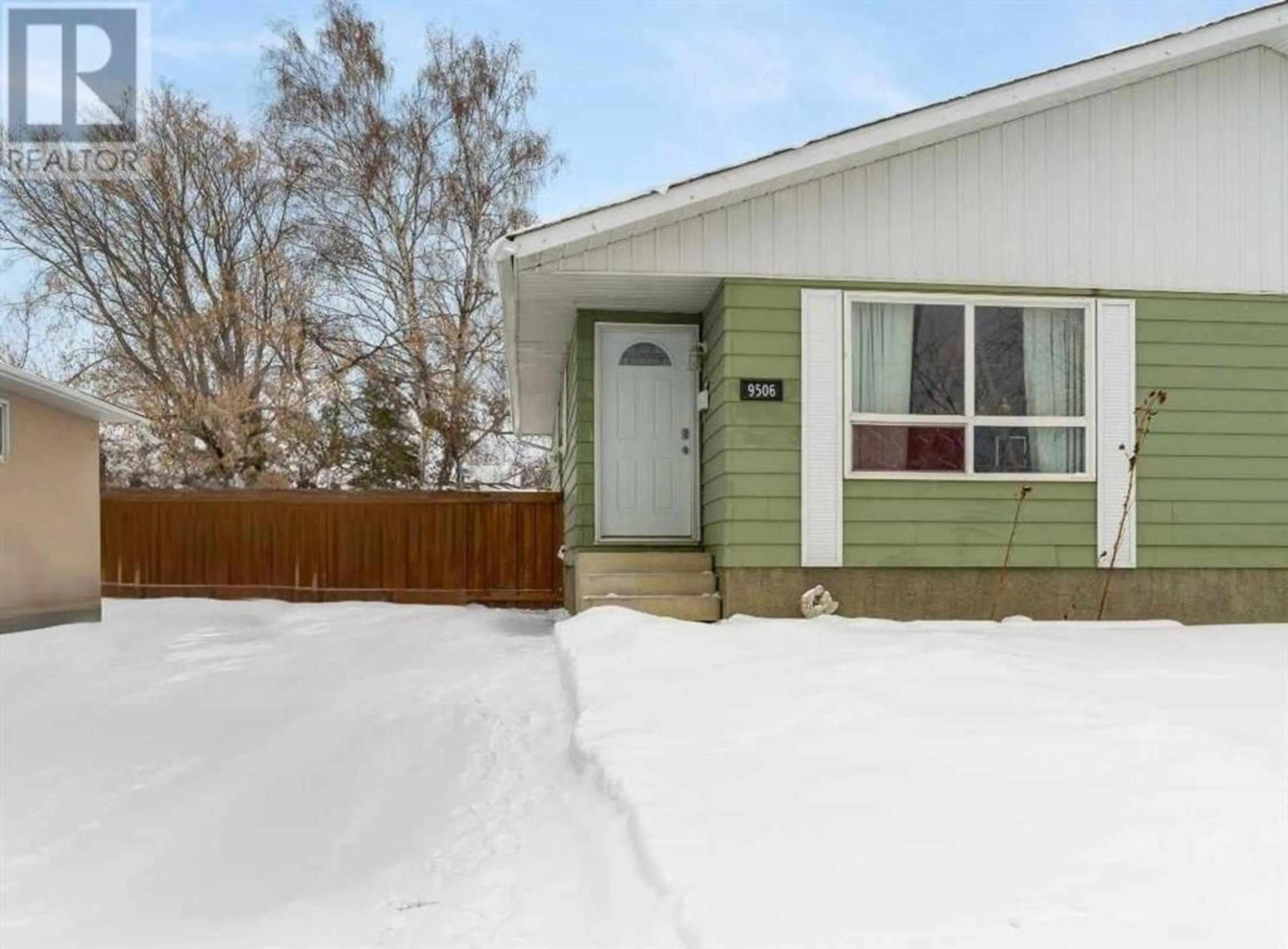 Frontside or backside of a home for 9506 76 Avenue, Grande Prairie Alberta T8V4T6