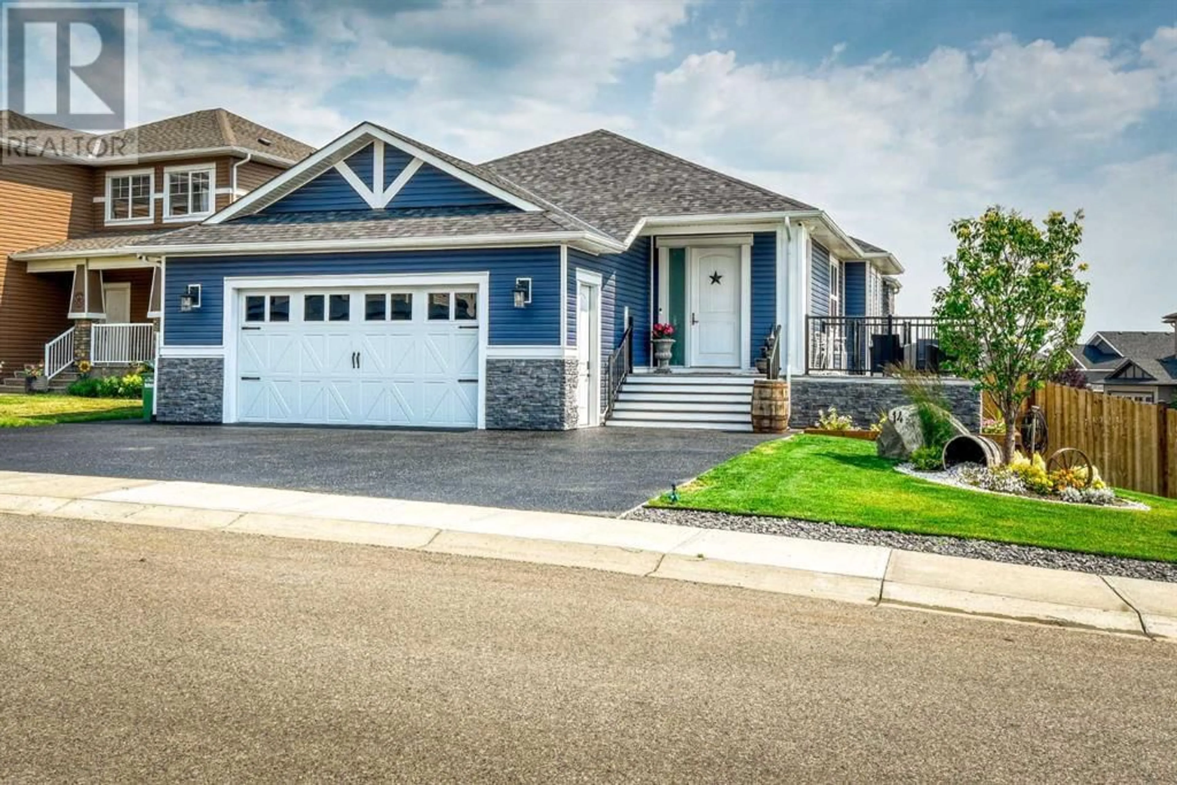 Frontside or backside of a home for 14 Lakes Estates Circle, Strathmore Alberta T1P0B7