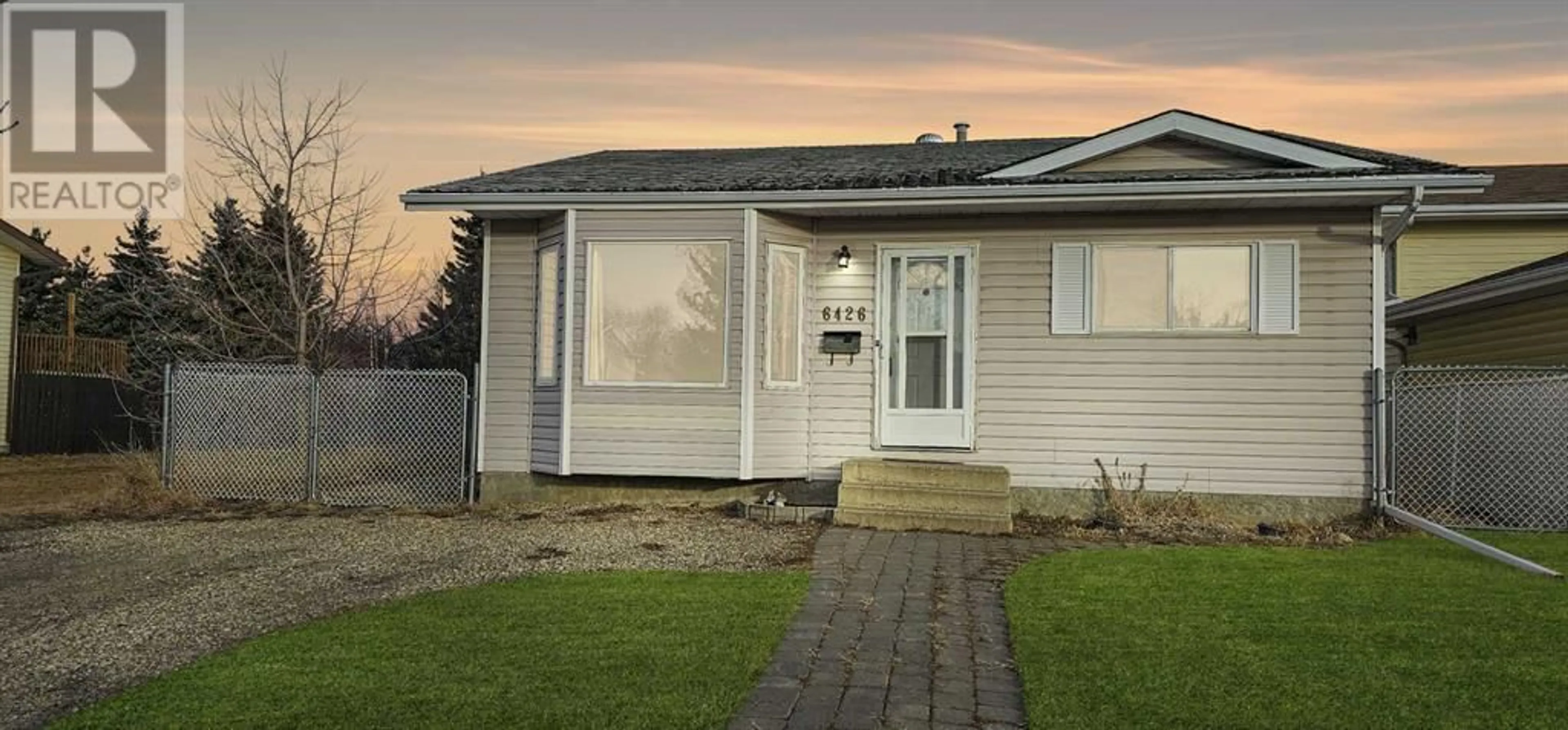 Frontside or backside of a home for 6426 Poplar Drive, Grande Prairie Alberta T8W2G2