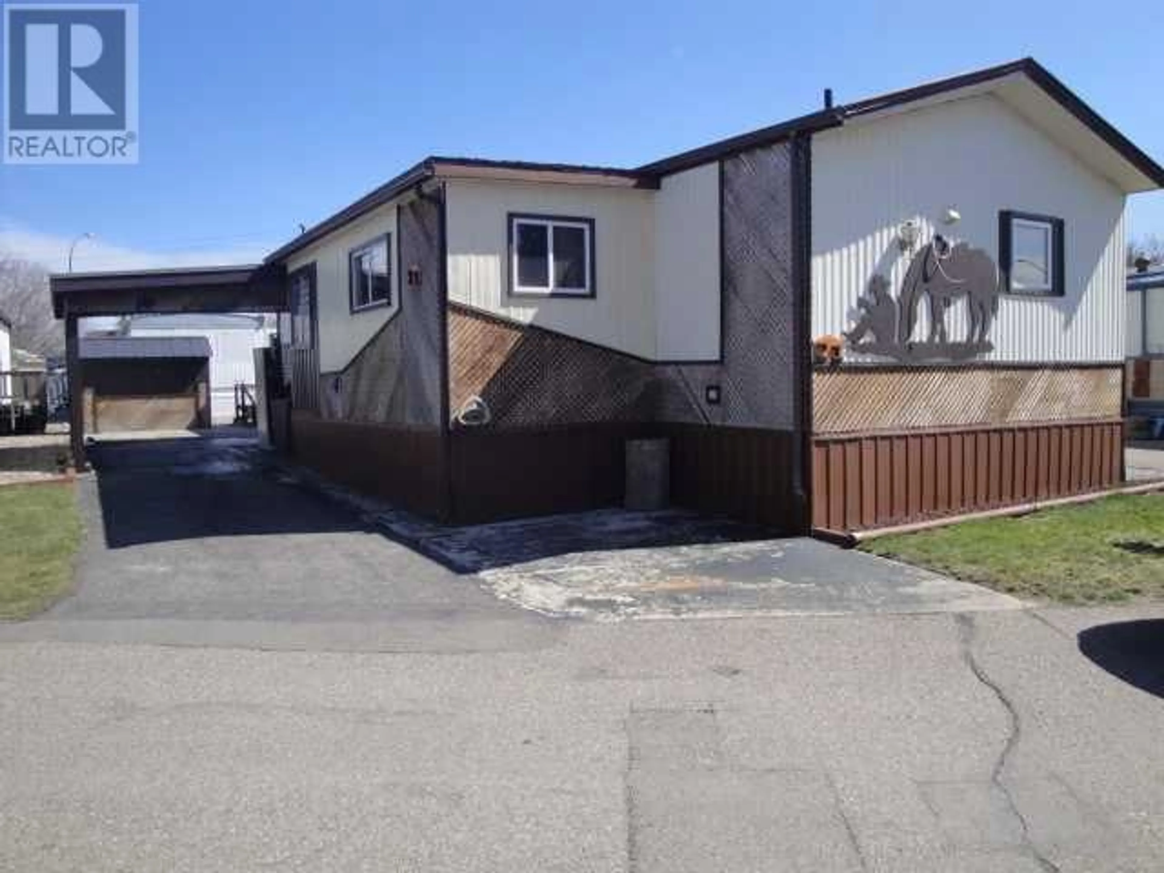 Frontside or backside of a home for 21 2300 13th Street N, Lethbridge Alberta T1H4E8