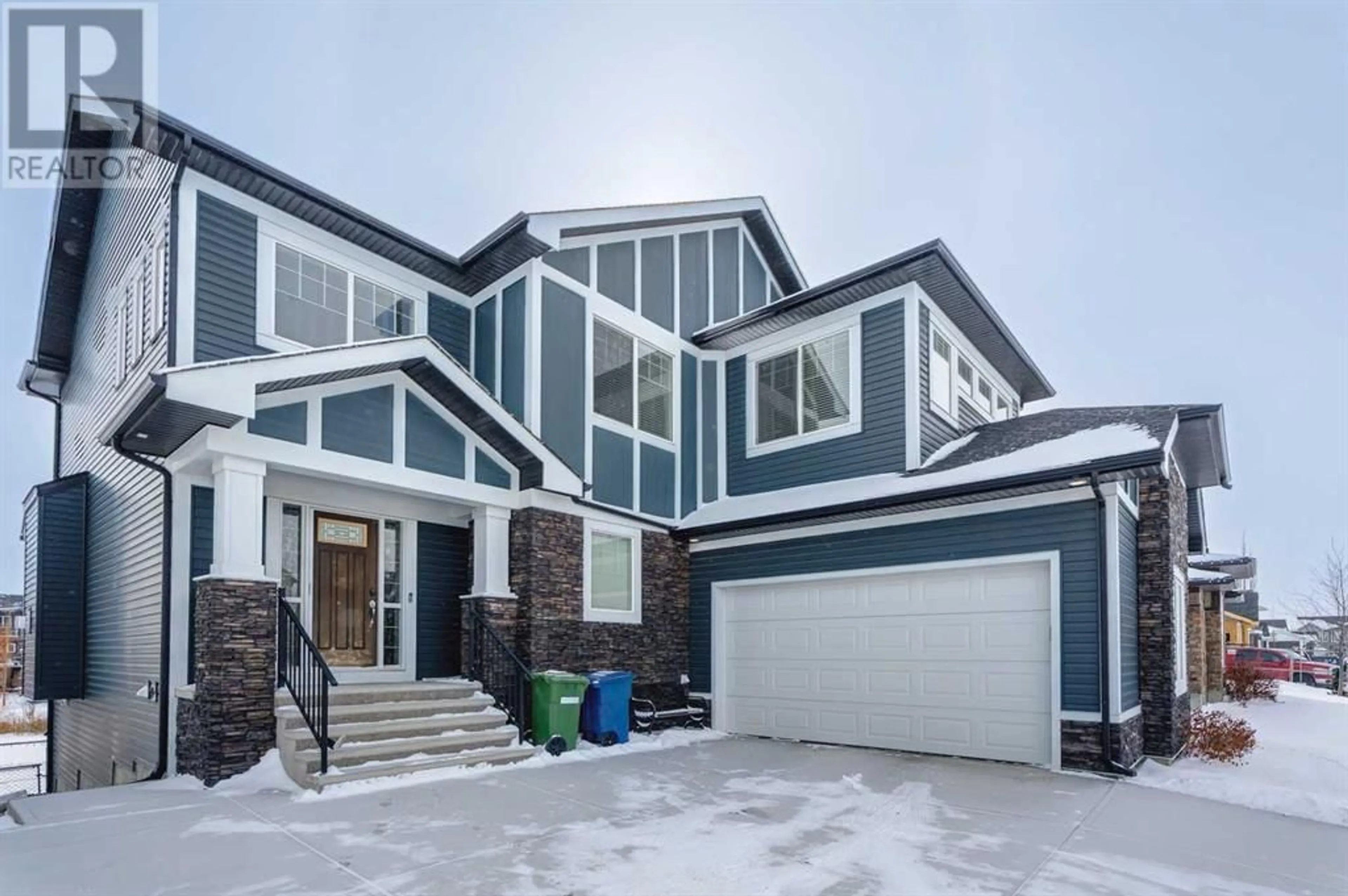 Frontside or backside of a home for 146 Canoe Crescent SW, Airdrie Alberta T4B2N9