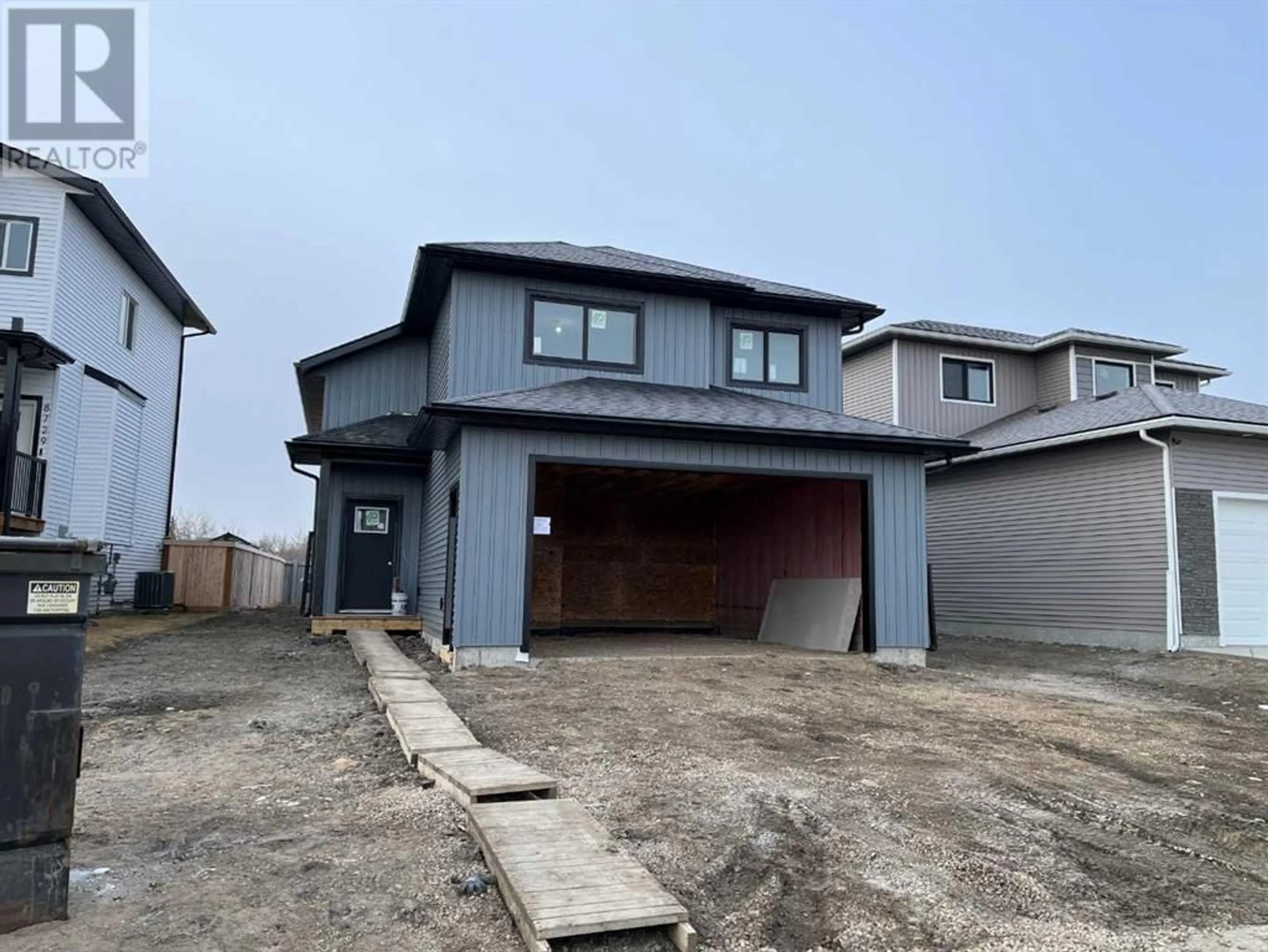 Frontside or backside of a home for 8733 122 Avenue, Grande Prairie Alberta T8X0P7