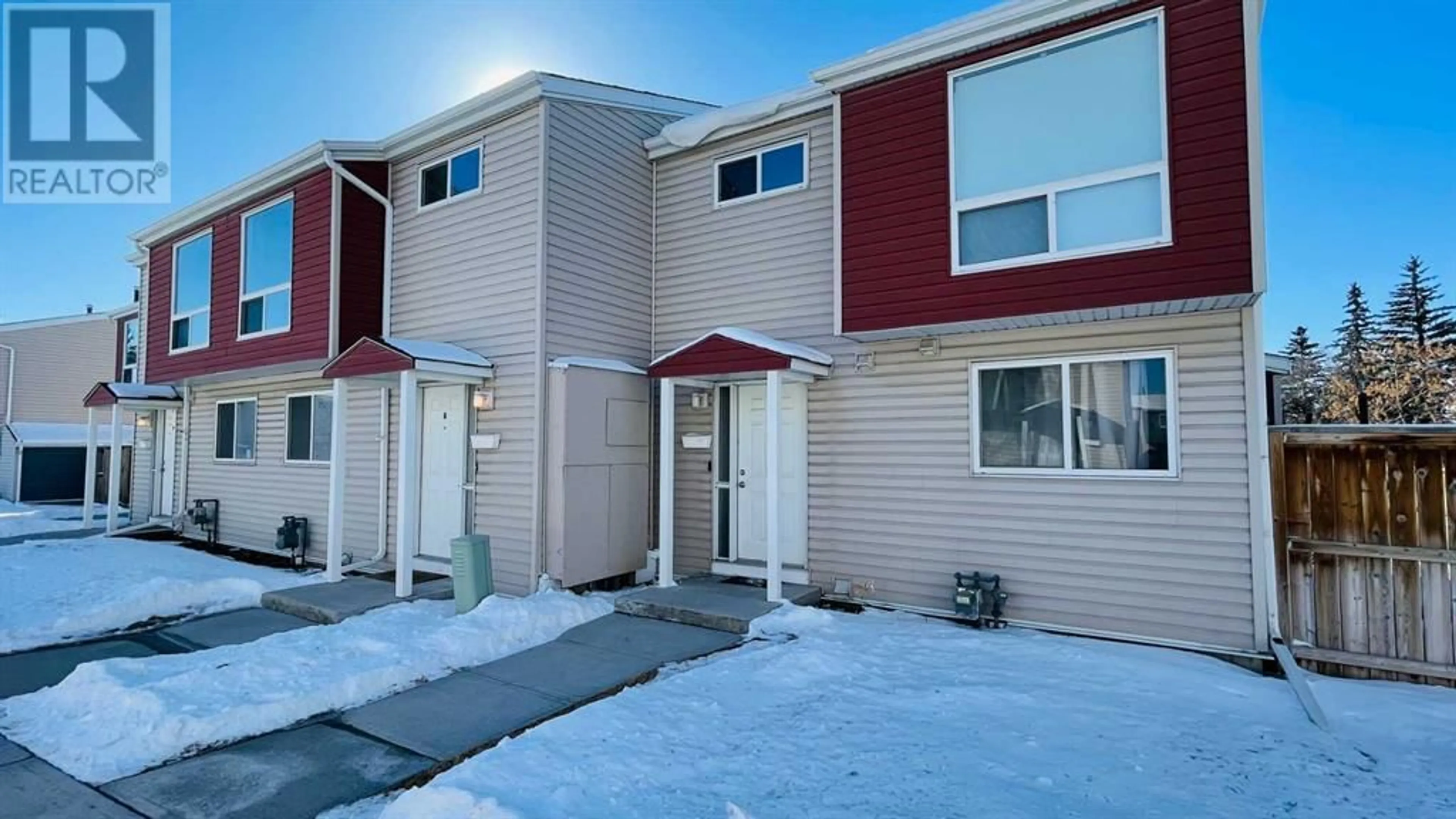 A pic from exterior of the house or condo for 8 5425 Pensacola Crescent SE, Calgary Alberta T2A2G7