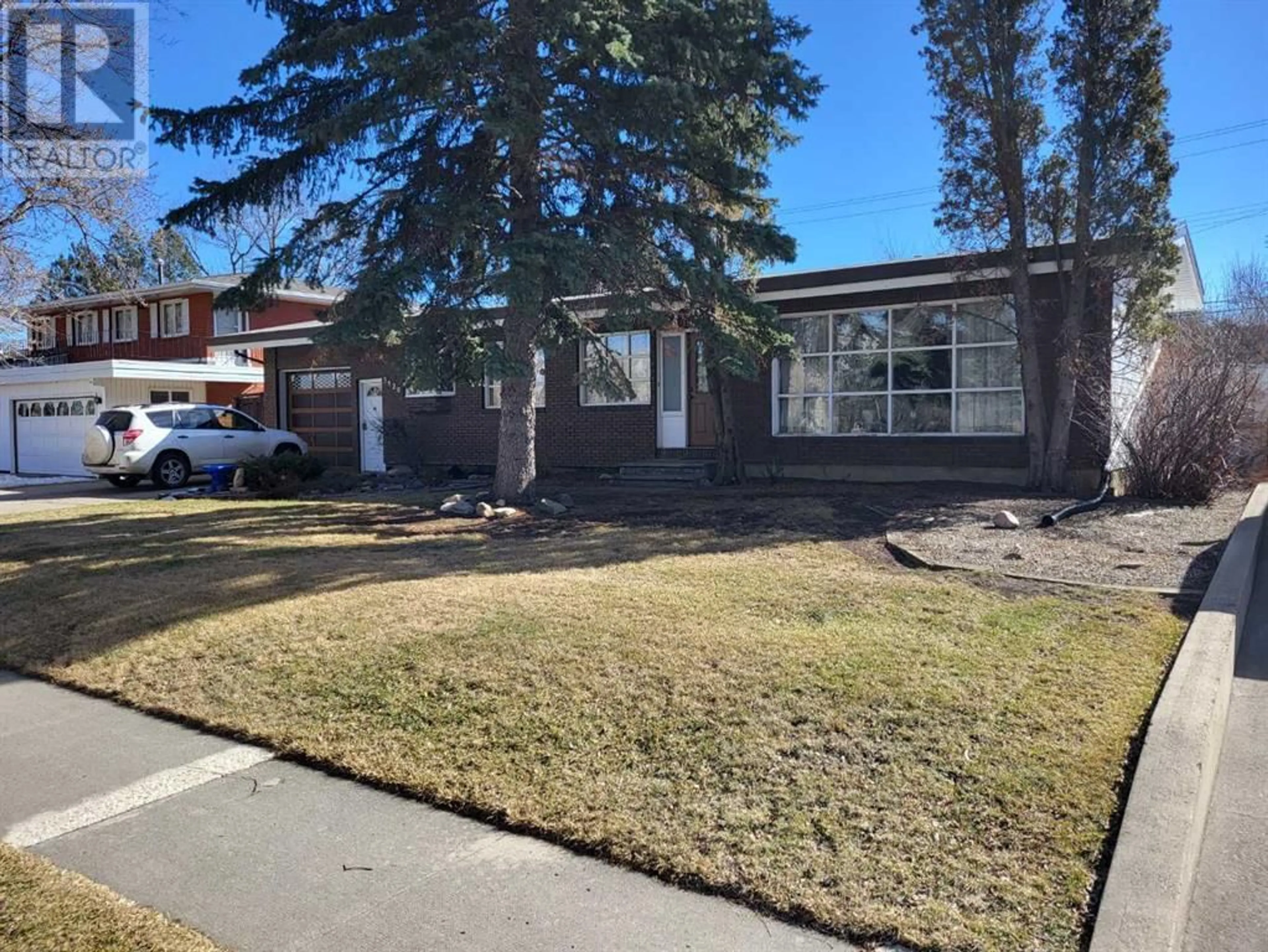 Frontside or backside of a home for 3520 South Parkside Drive S, Lethbridge Alberta T1K0E3