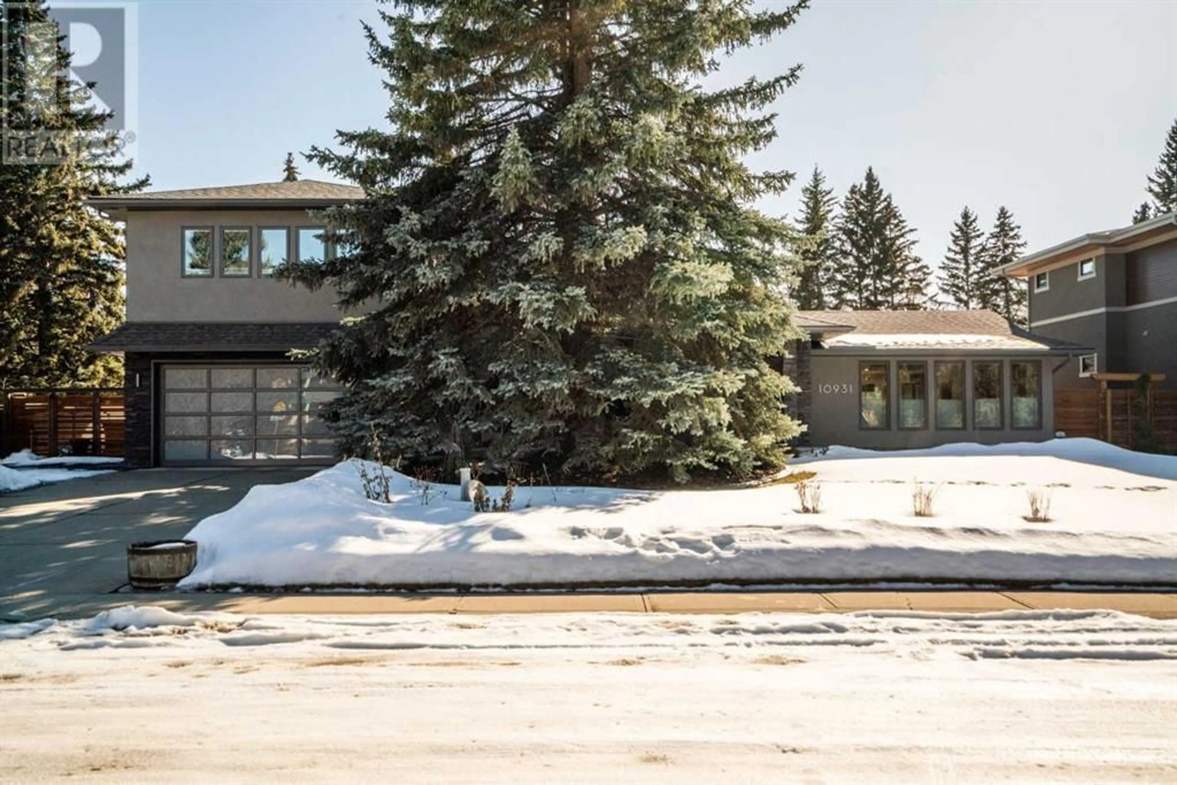 Frontside or backside of a home for 10931 Willowfern Drive SE, Calgary Alberta T1J1R6